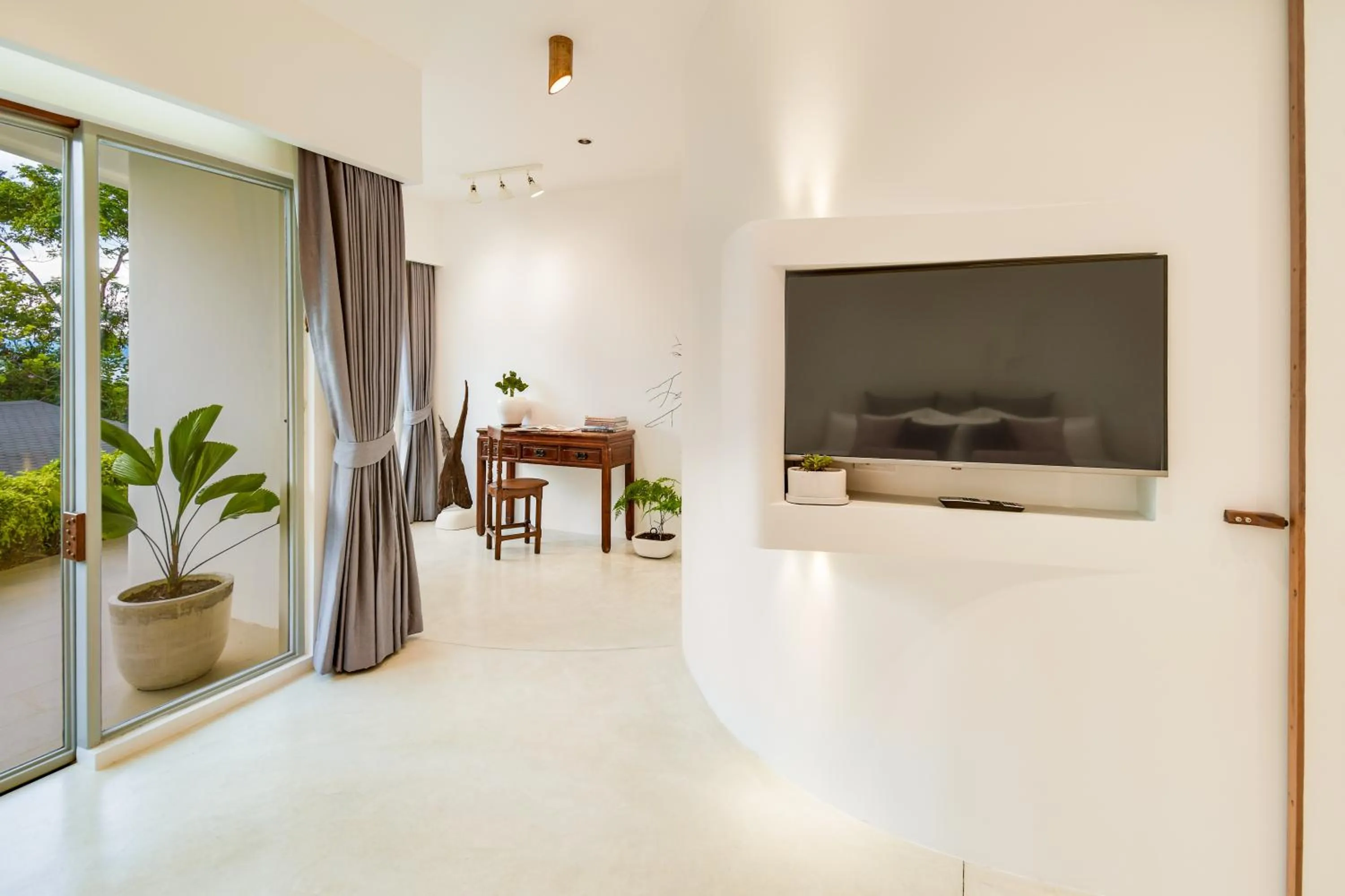 Communal lounge/ TV room in Ampersand Resort