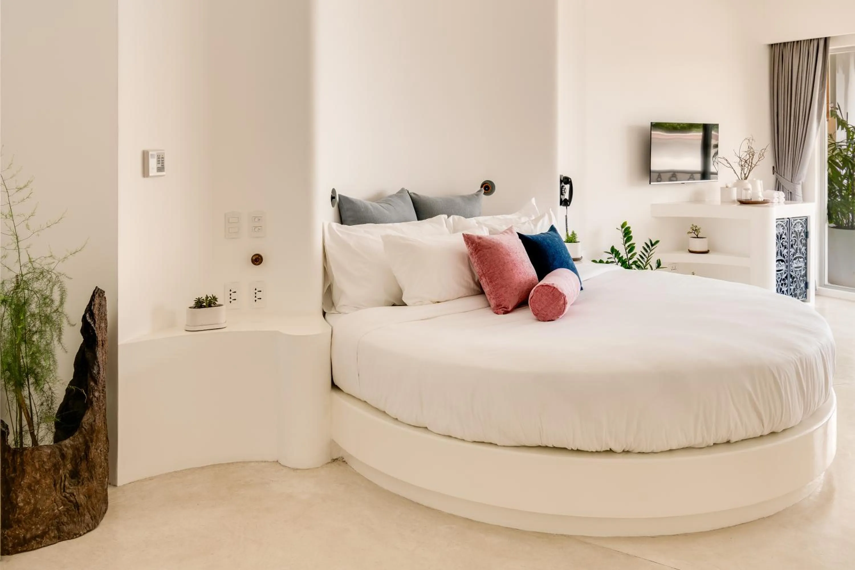 Bed in Ampersand Resort