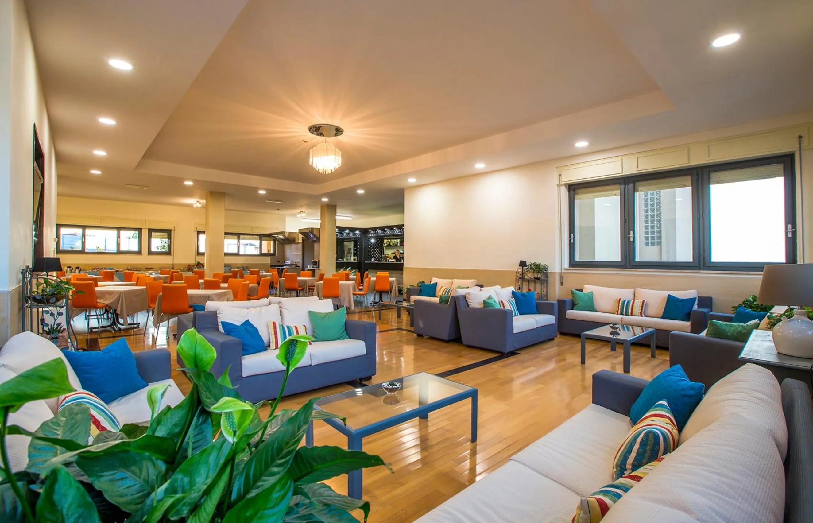 Communal lounge/ TV room in Hotel Residence Ulivi E Palme