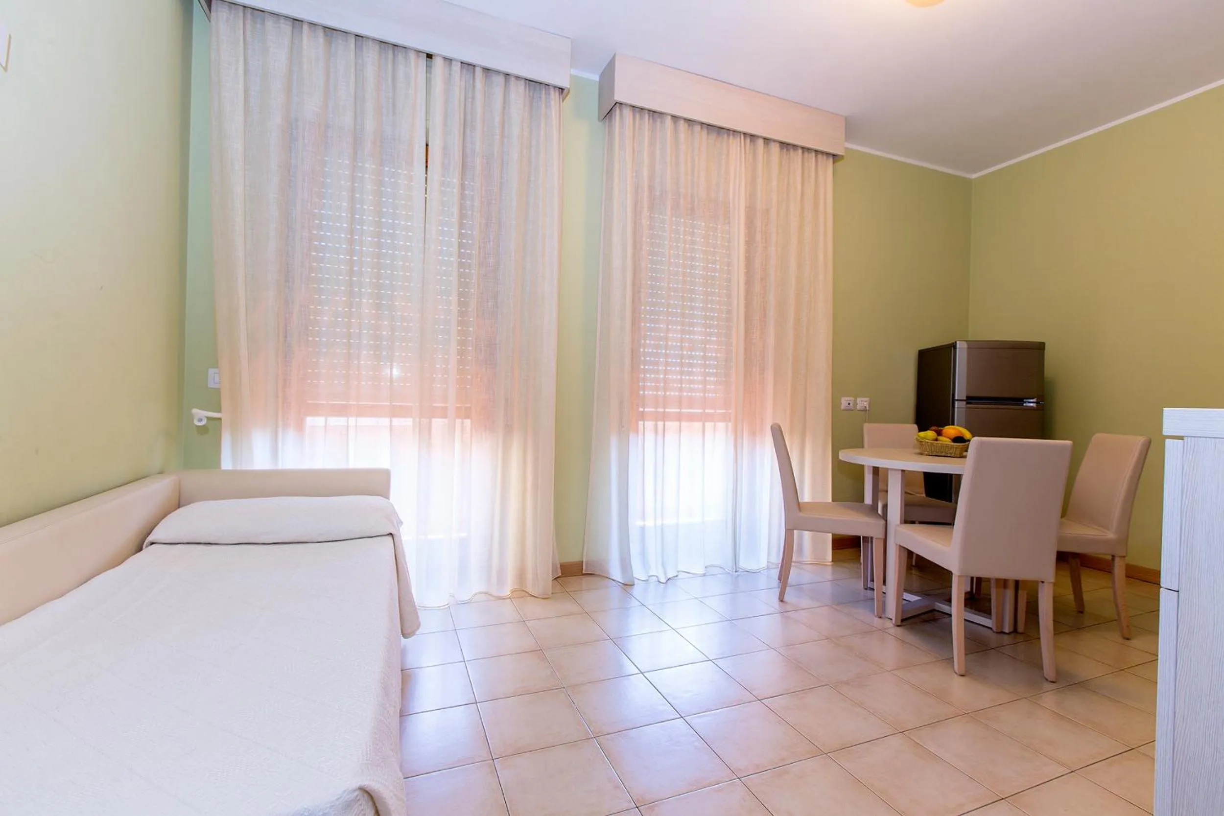 Living room, Bed in Hotel Residence Ulivi E Palme