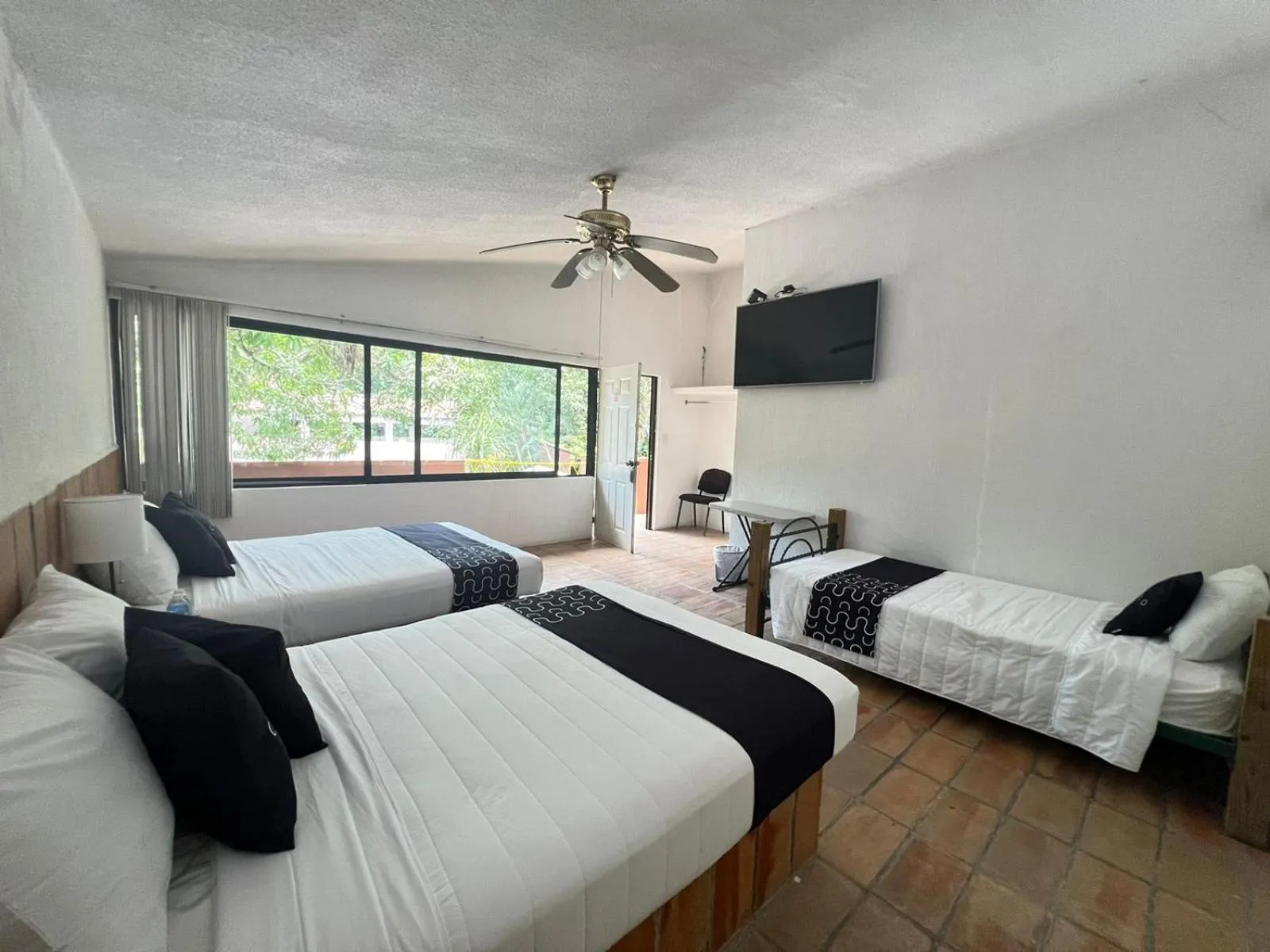 Photo of the whole room, Bed in Cotlamani Hotel Aventura