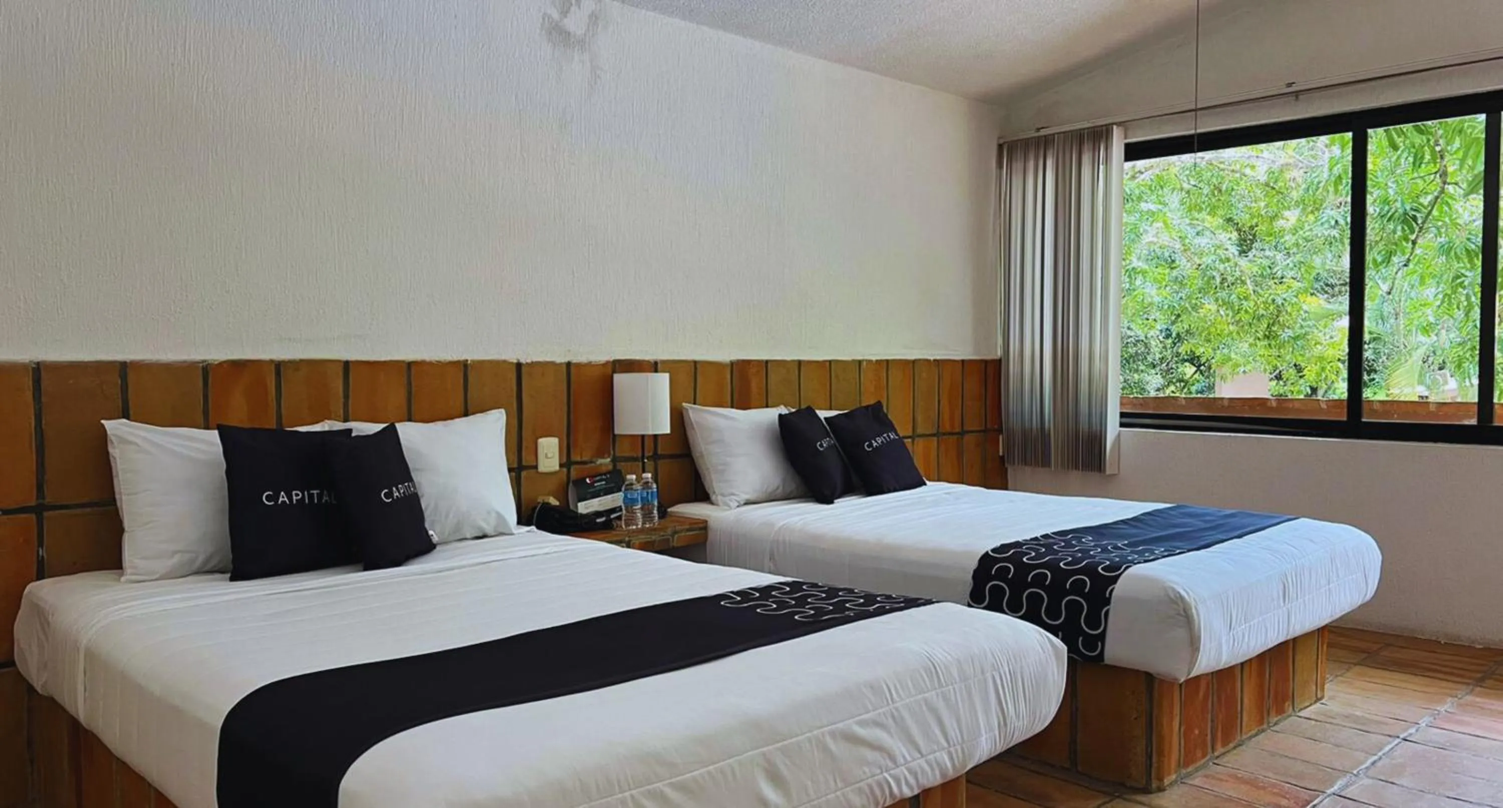 Photo of the whole room, Bed in Cotlamani Hotel Aventura