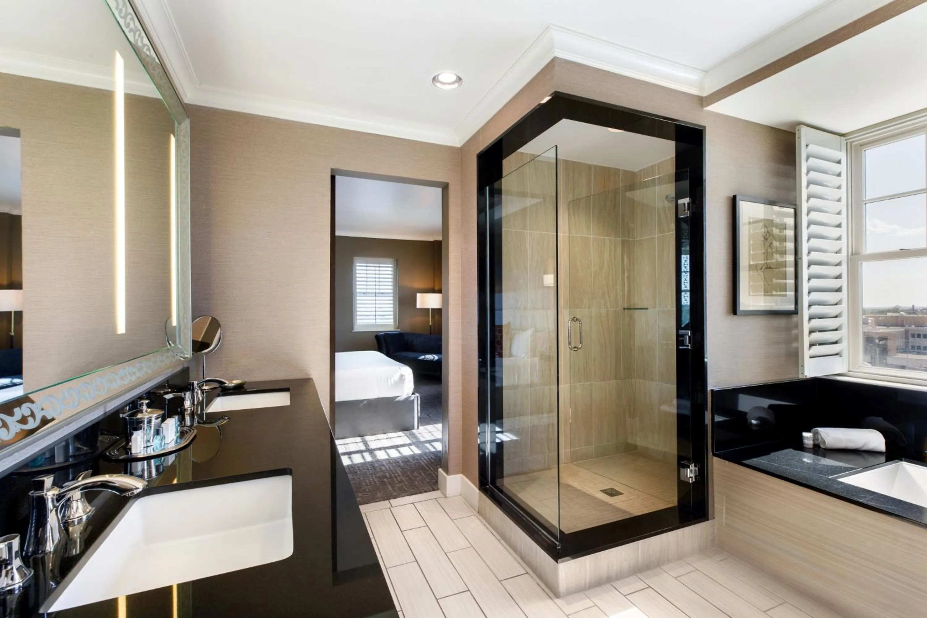 Bathroom, Bed in Ambassador Hotel Oklahoma City, Autograph Collection