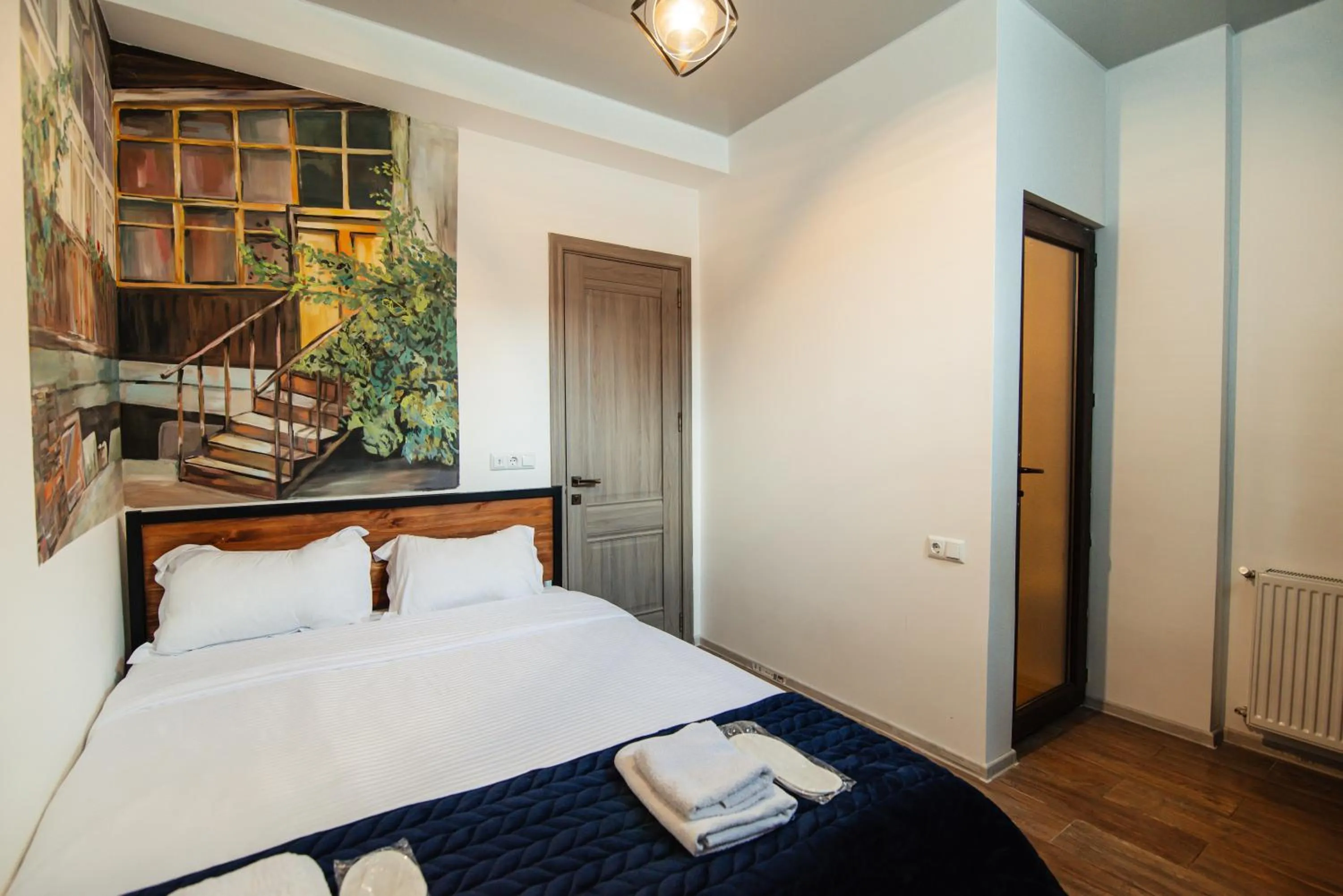 Bed in Hotel Boutique George