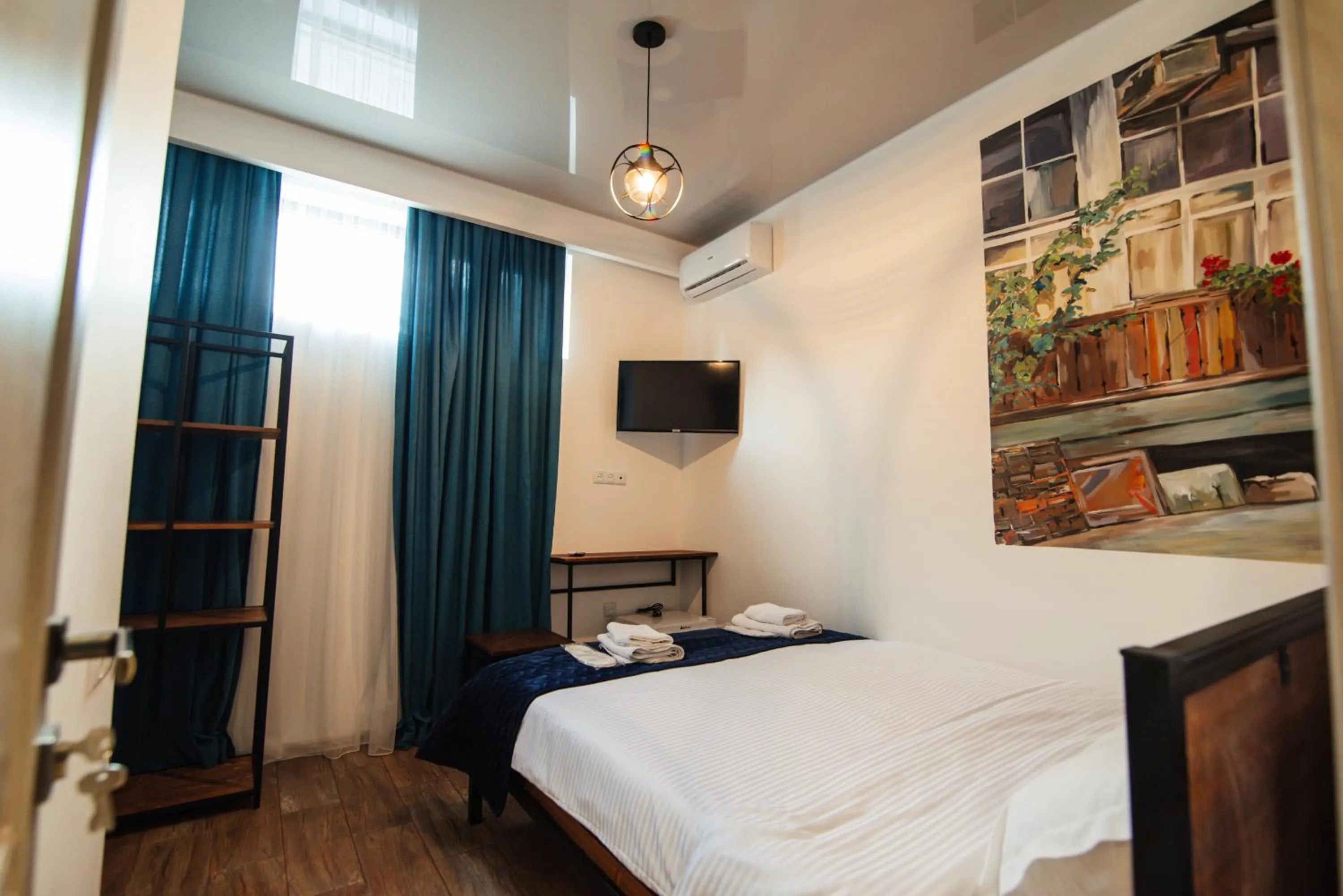 TV and multimedia, Bed in Hotel Boutique George