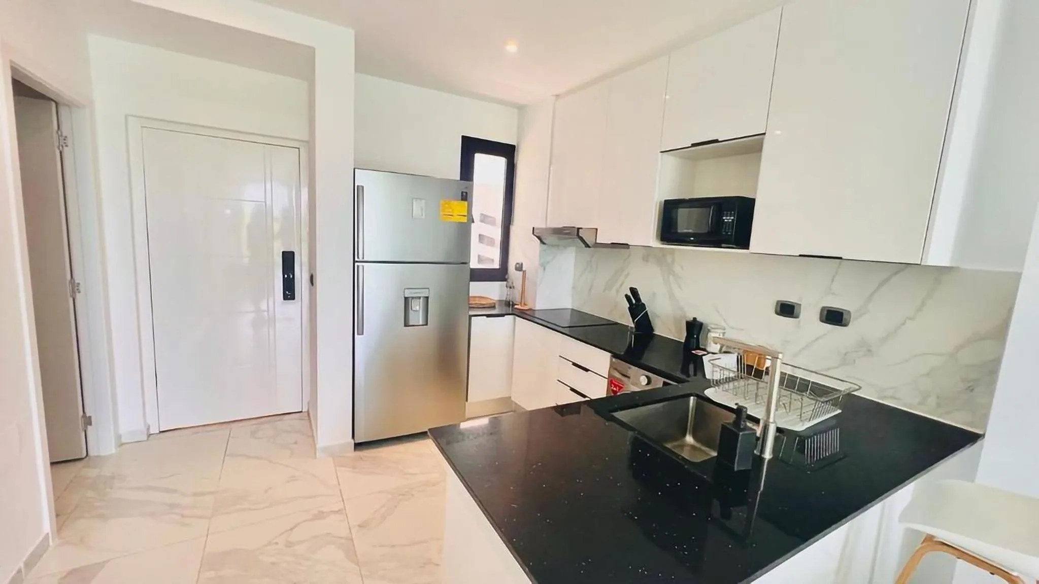 kitchen in Luxury Apartment With Pool And Golf View