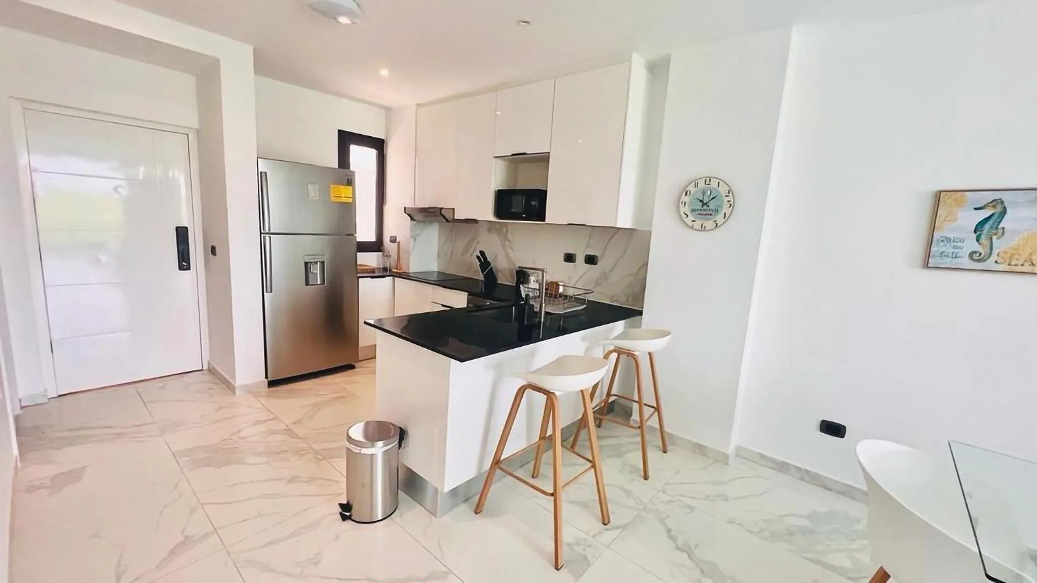 kitchen in Luxury Apartment With Pool And Golf View