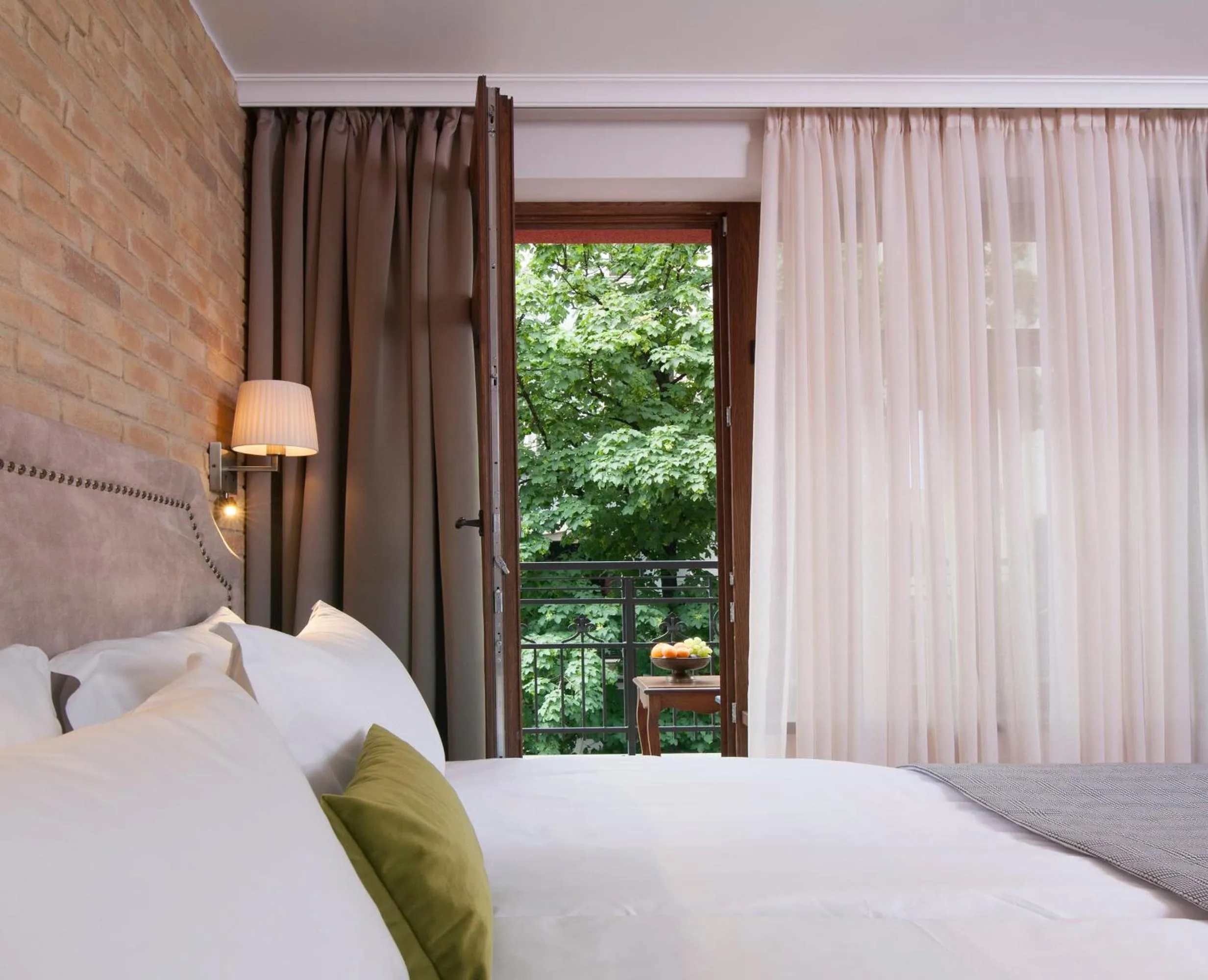 Bed in Villa Flavia Heritage Boutique Hotel