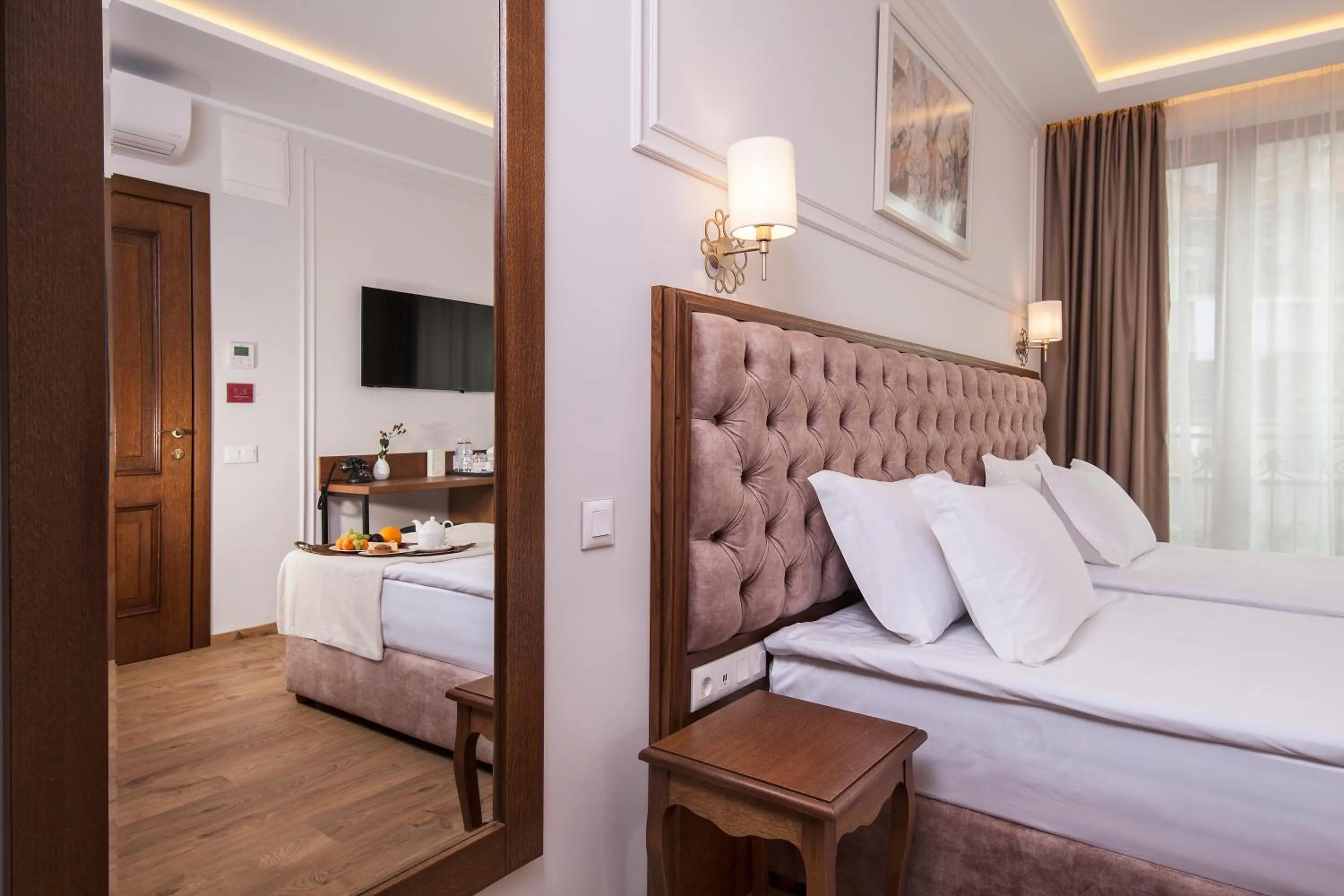 Bed in Villa Flavia Heritage Boutique Hotel