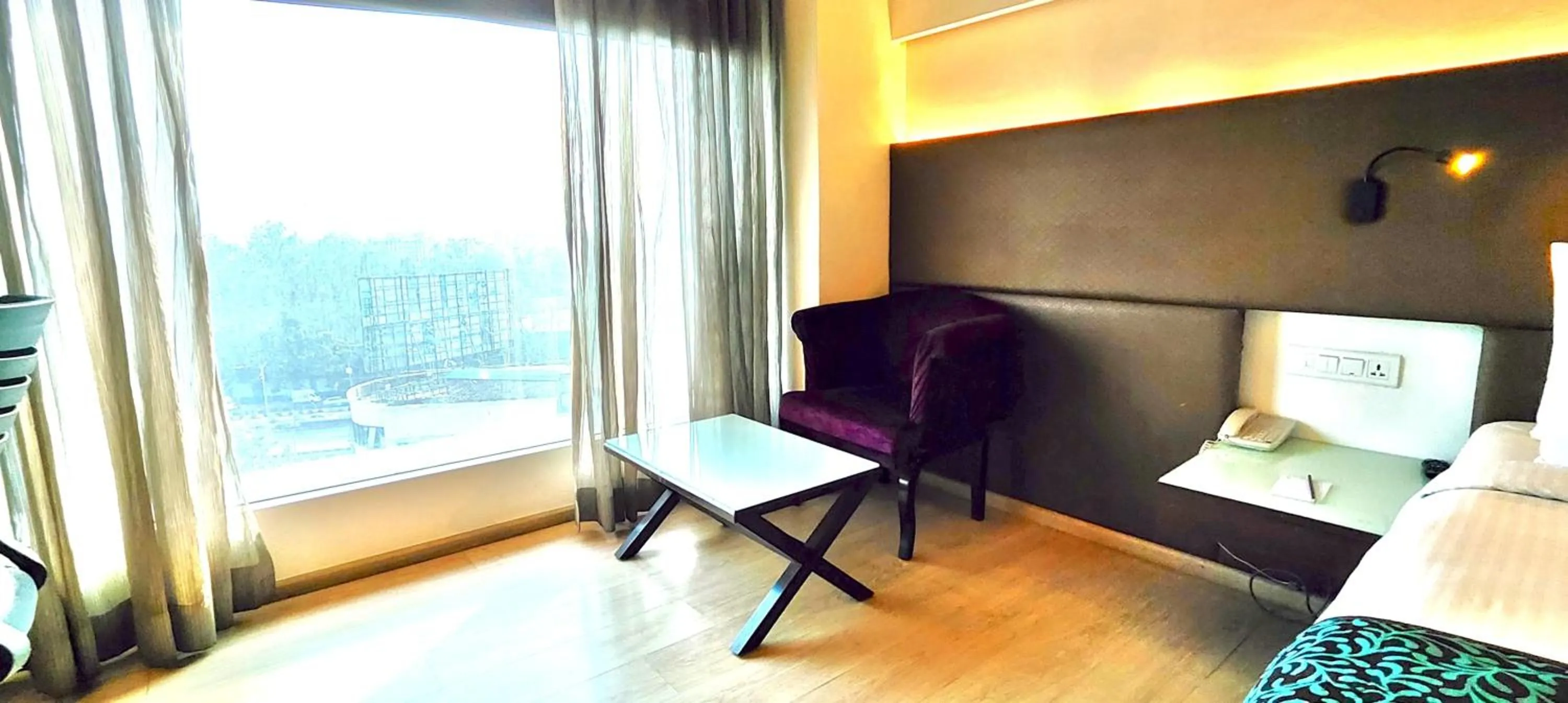 Seating area, Bed in Regenta Central Grand Exotica