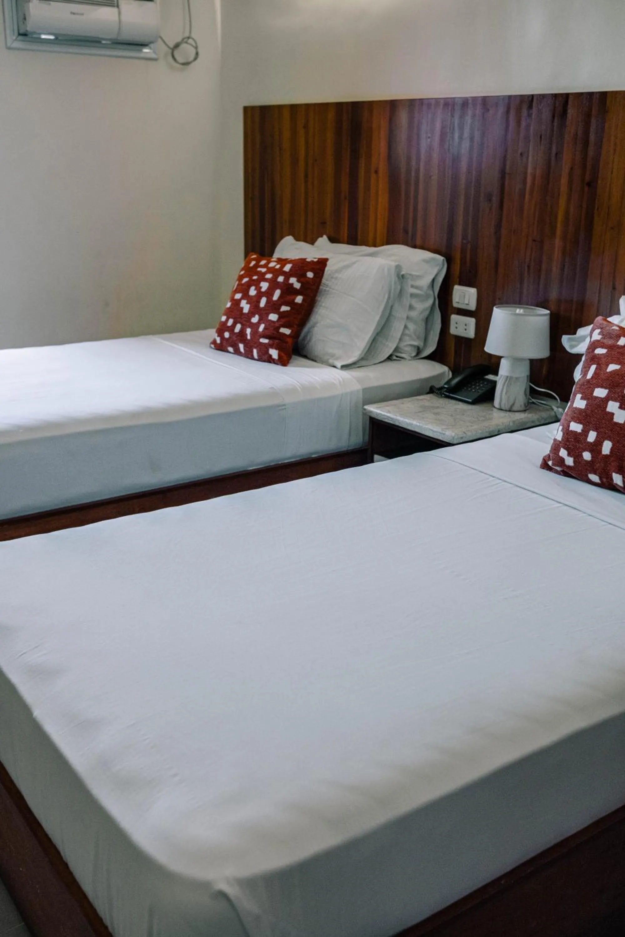 Bed in Tsai Hotel and Residences