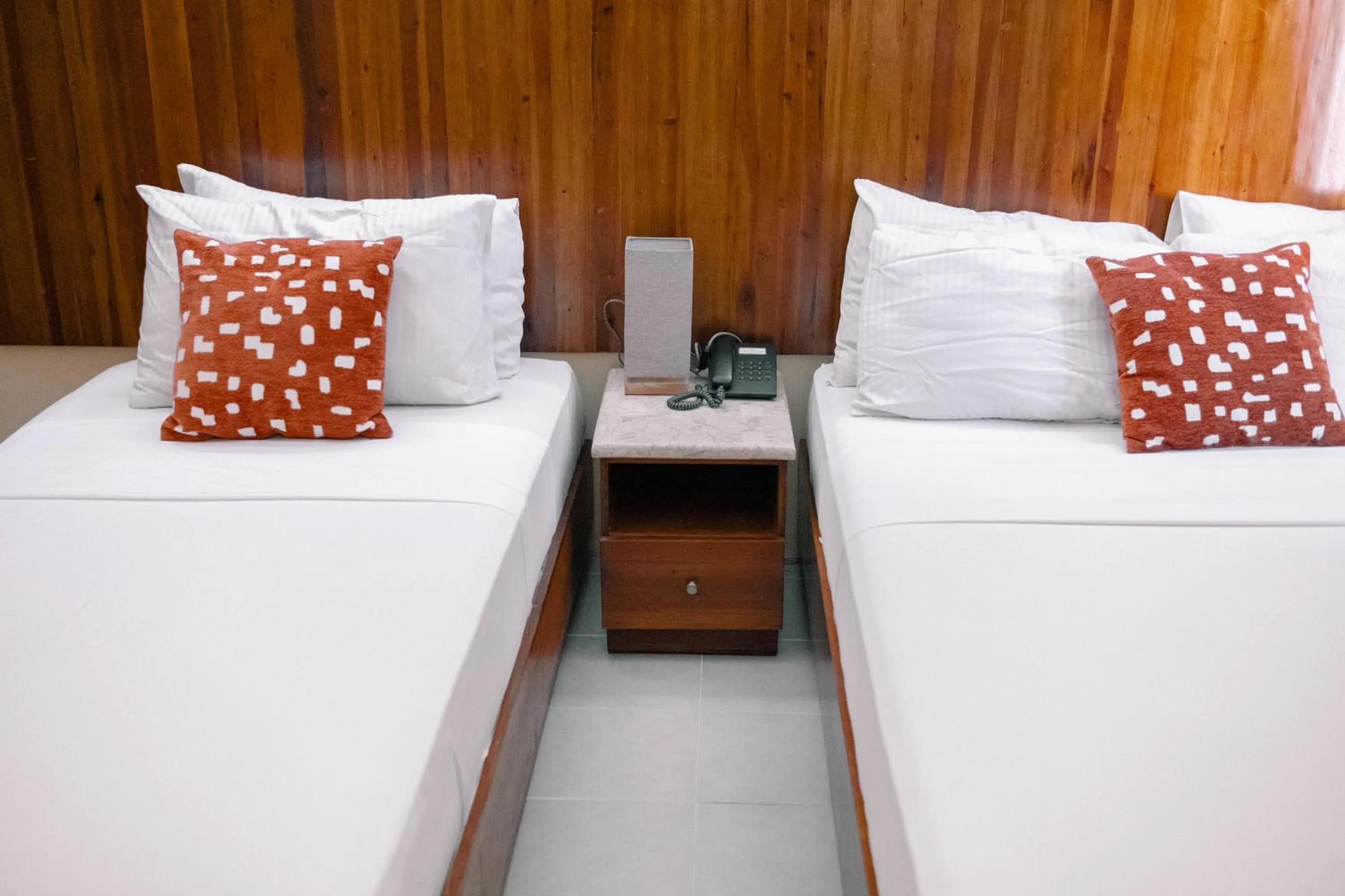 Bed in Tsai Hotel and Residences