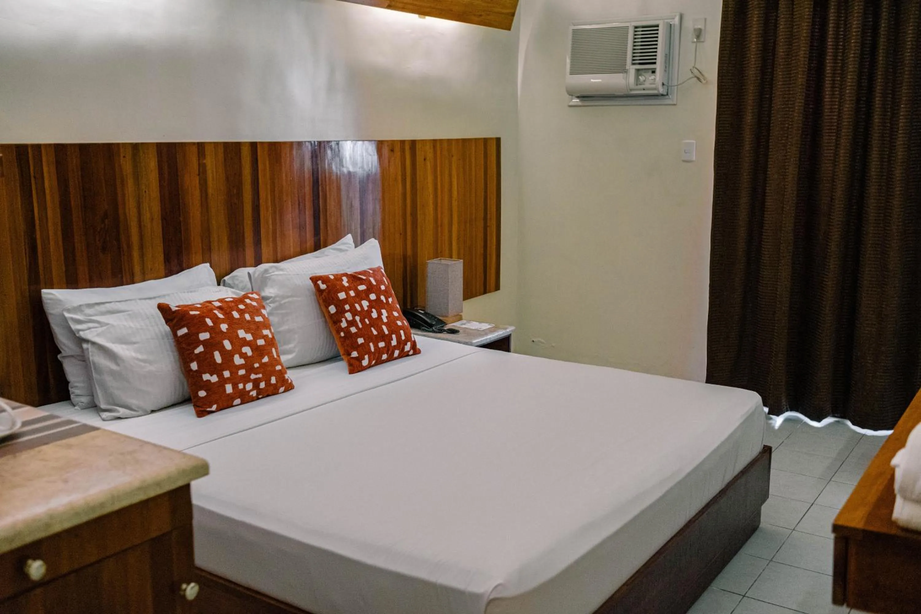 Bed in Tsai Hotel and Residences