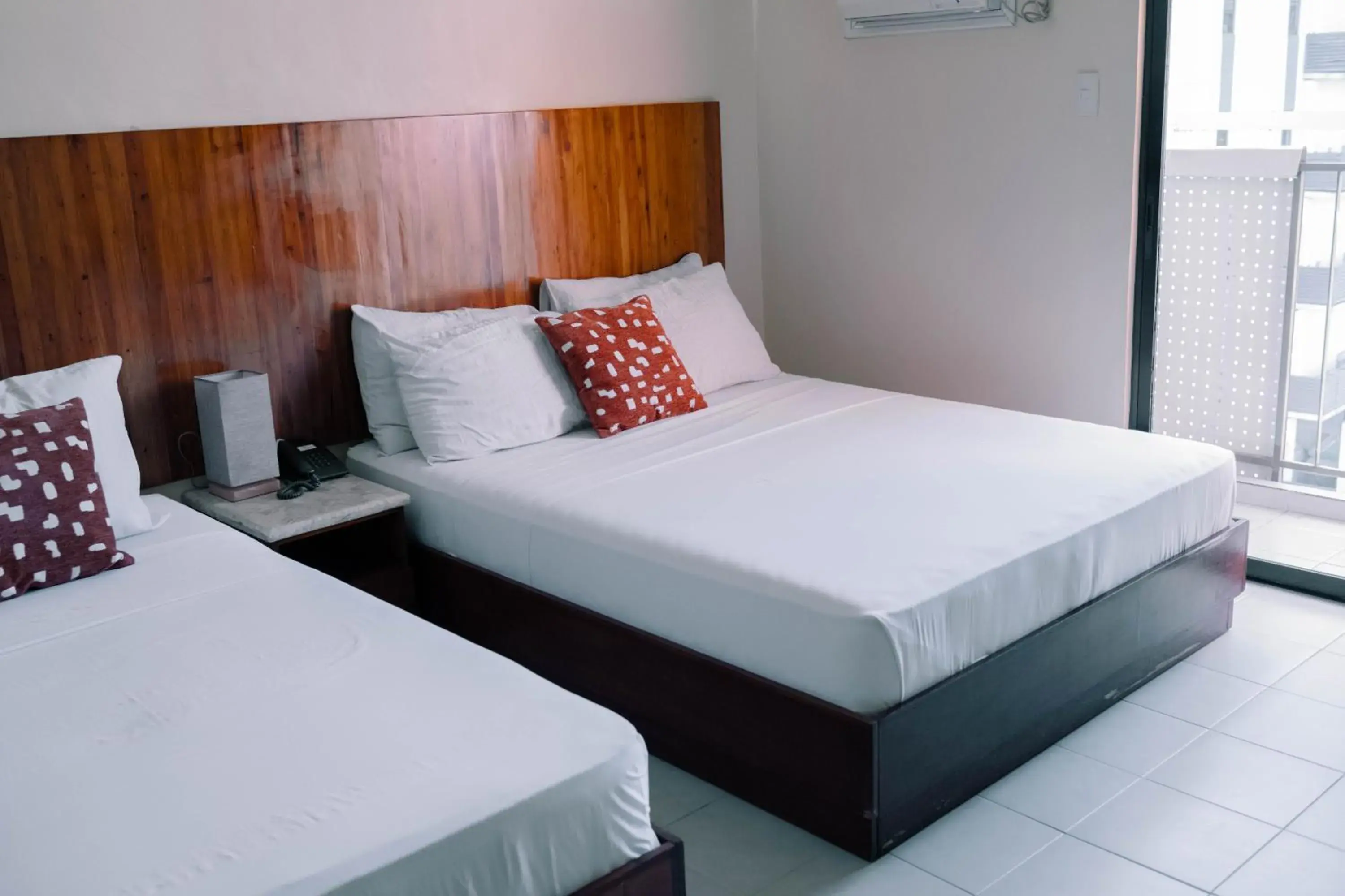 Triple Room with Balcony in Tsai Hotel and Residences Triple Room with Balcony in Tsai Hotel and Residences