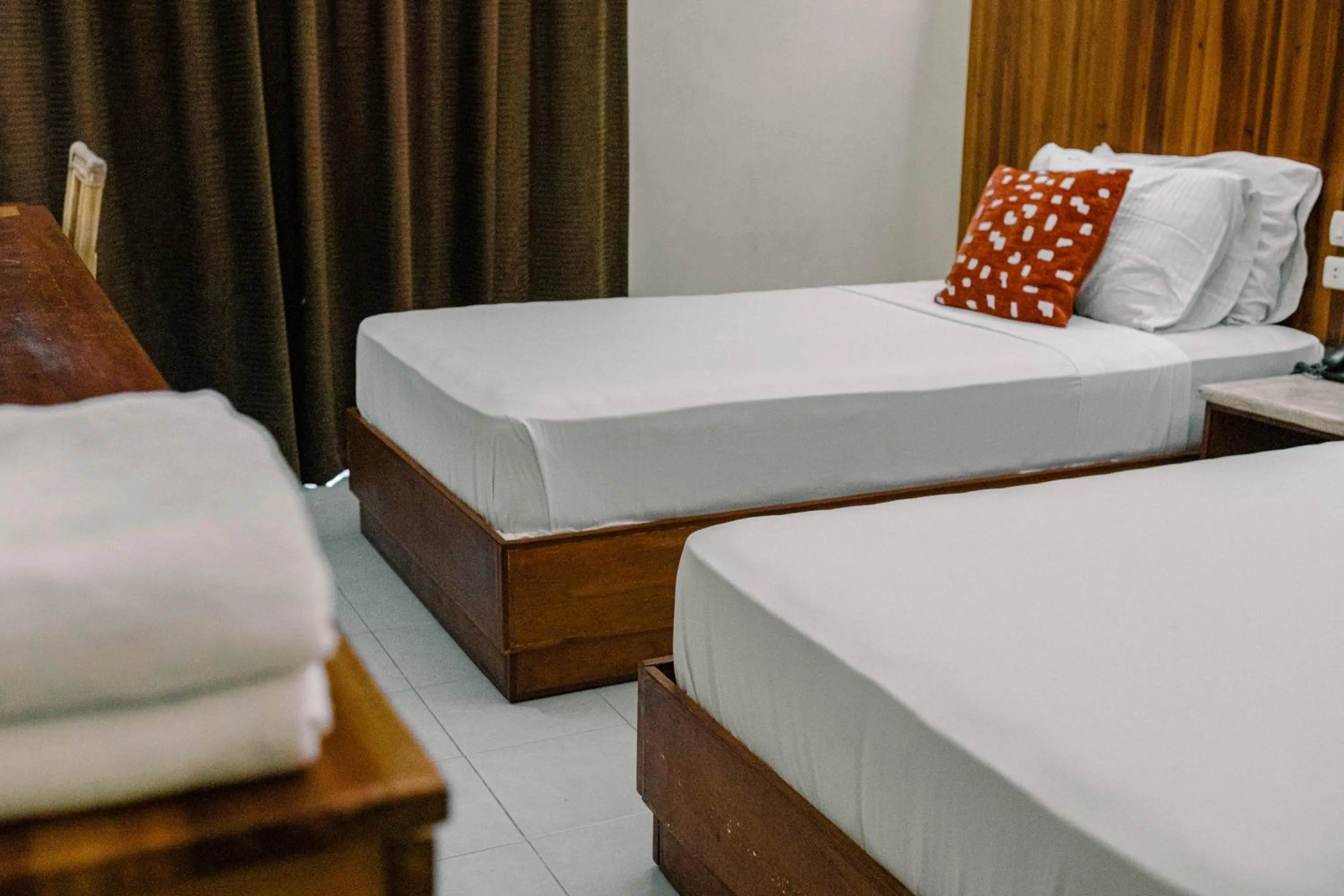 Bed in Tsai Hotel and Residences