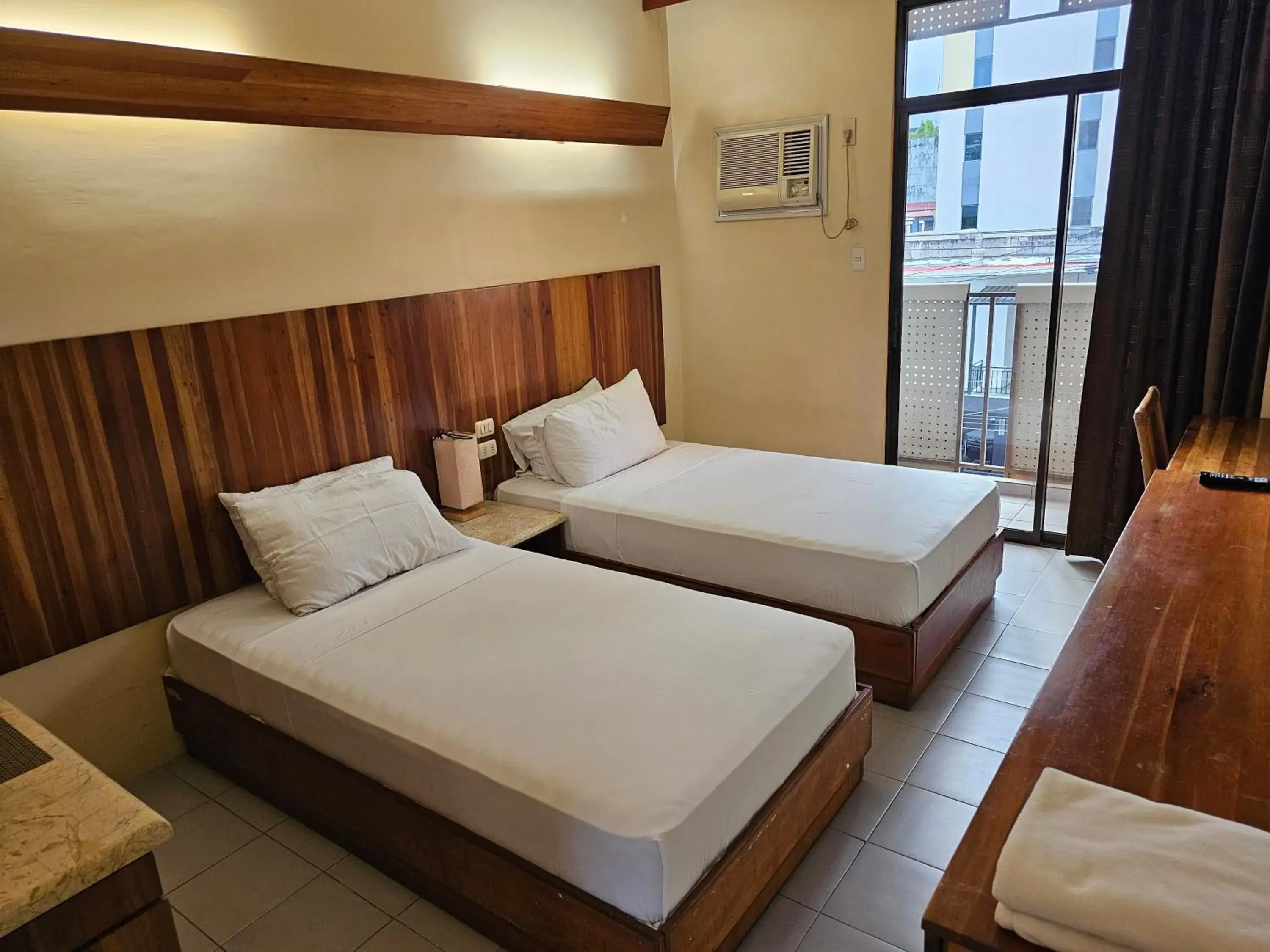 Twin Room with Balcony in Tsai Hotel and Residences Twin Room with Balcony in Tsai Hotel and Residences