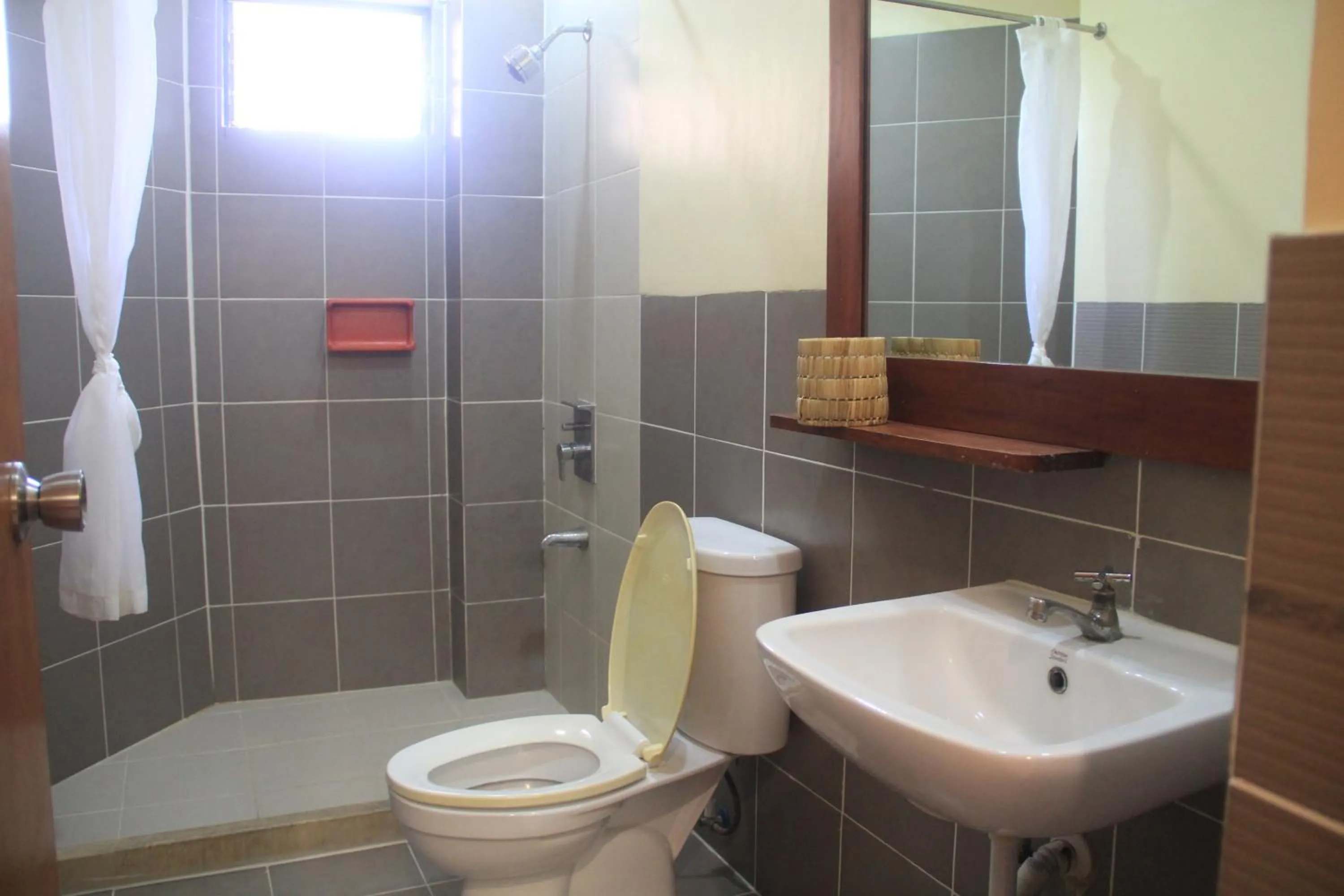 Shower in Tsai Hotel and Residences