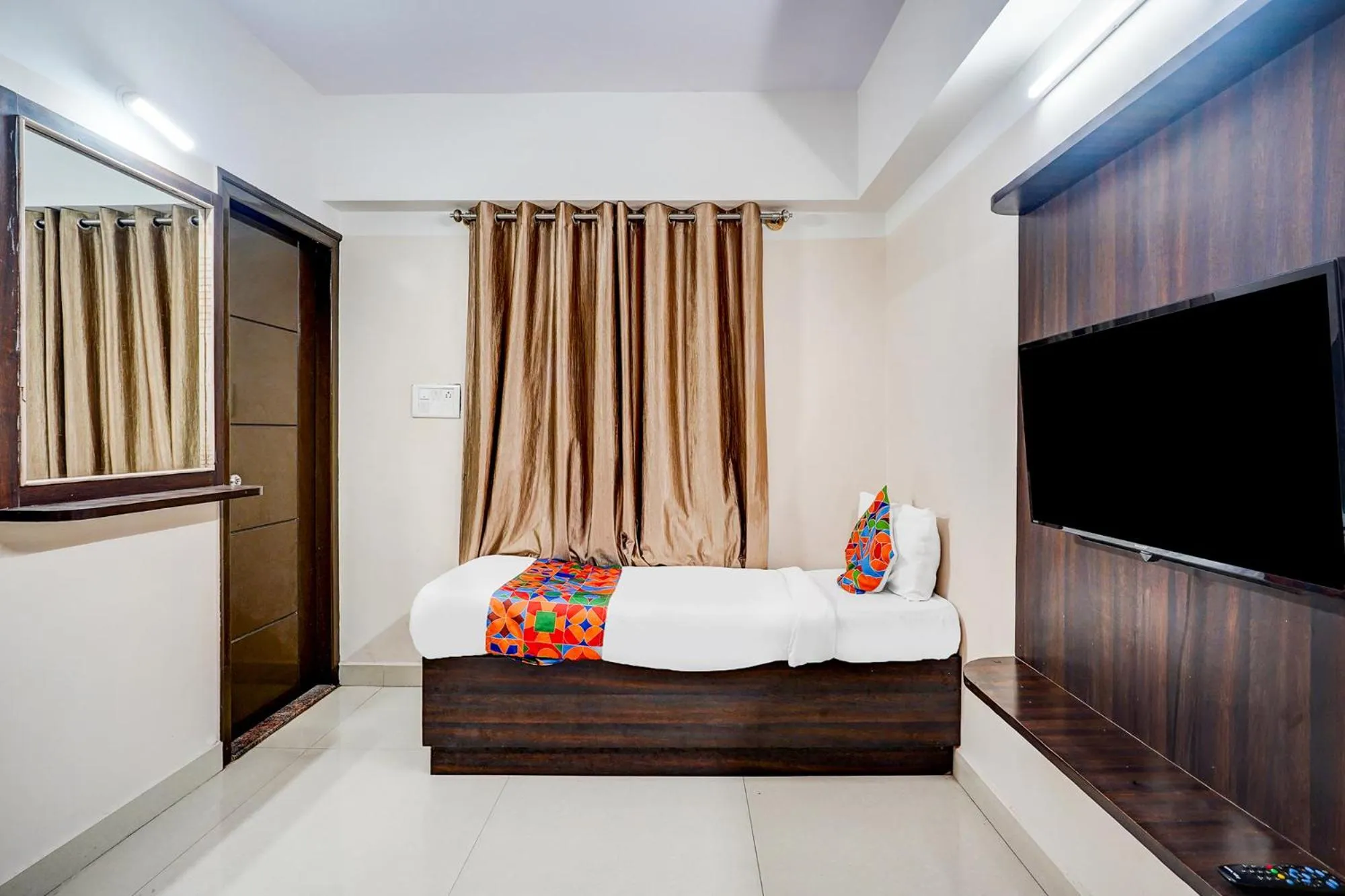 Bedroom, Bed in FabHotel Pride Image - Rajarajeshwari Nagar