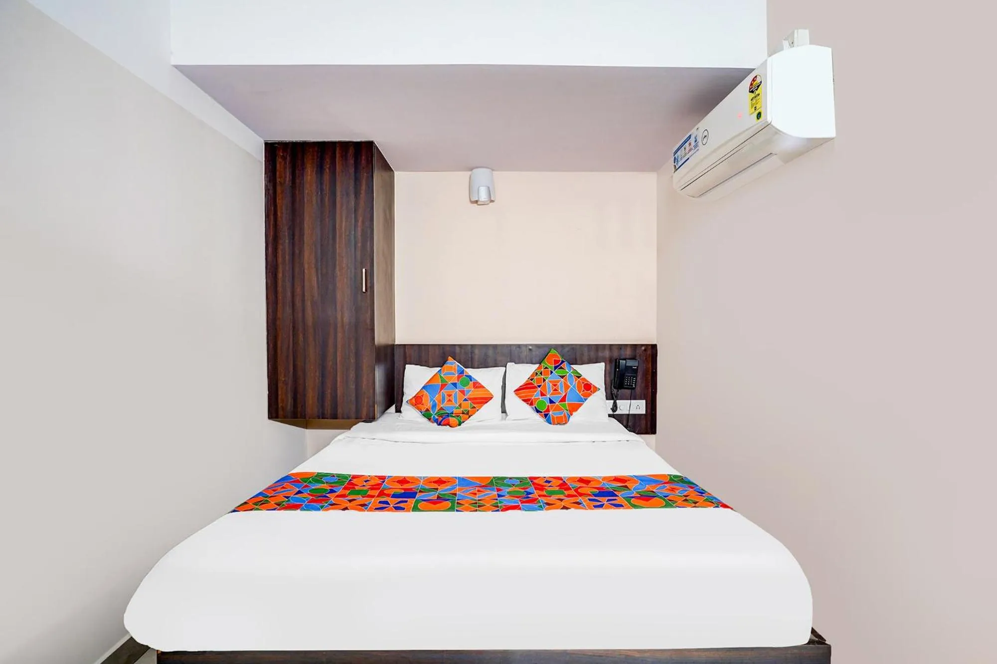 Bed in FabHotel Pride Image - Rajarajeshwari Nagar