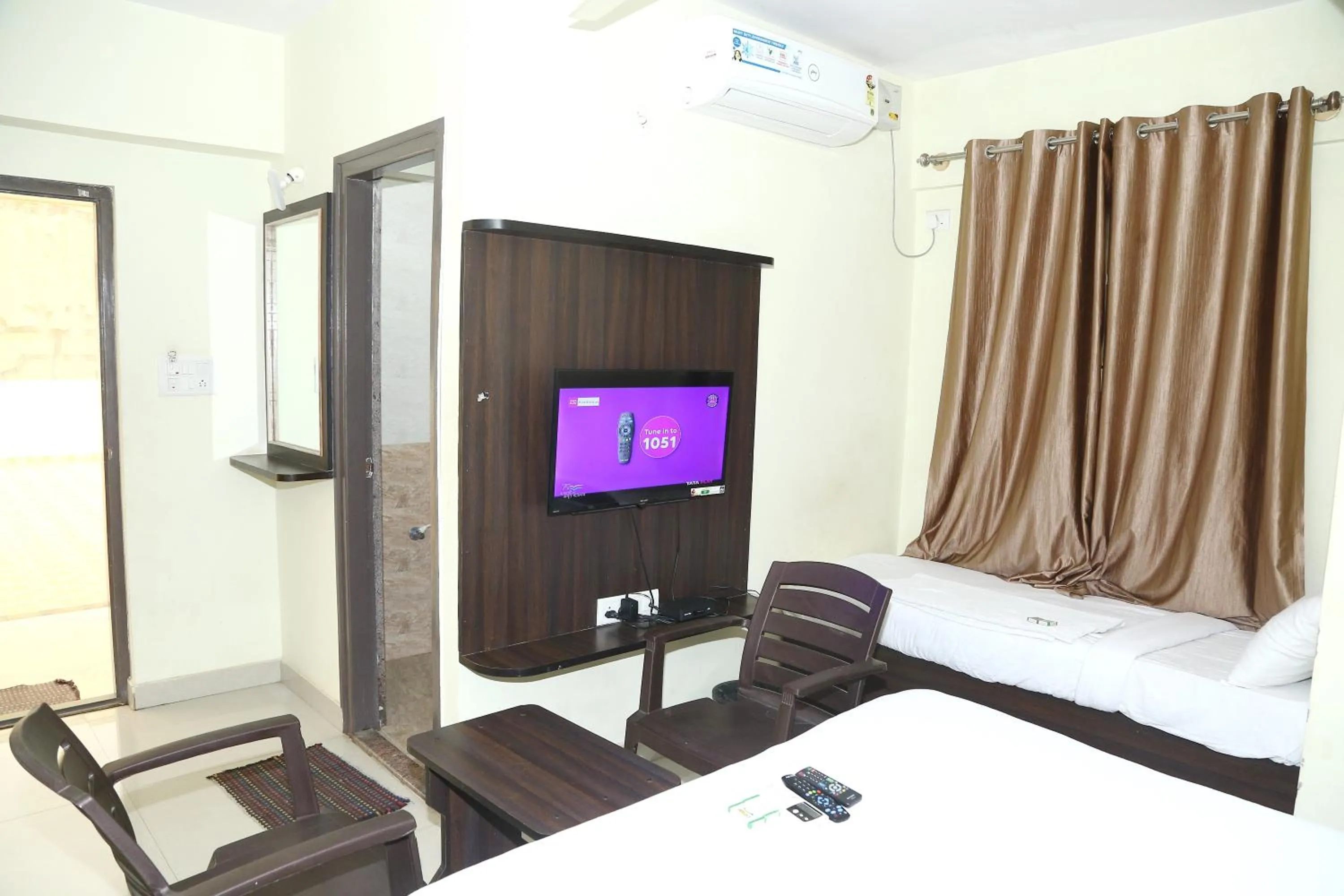 Classic Triple Room in FabHotel Pride Image - Rajarajeshwari Nagar