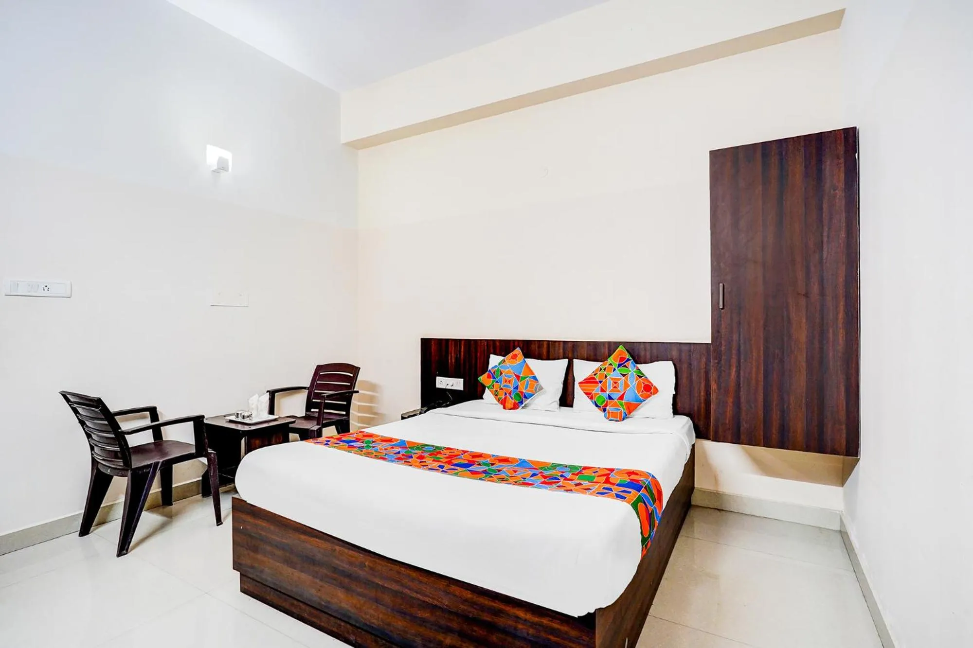 Bed in FabHotel Pride Image - Rajarajeshwari Nagar
