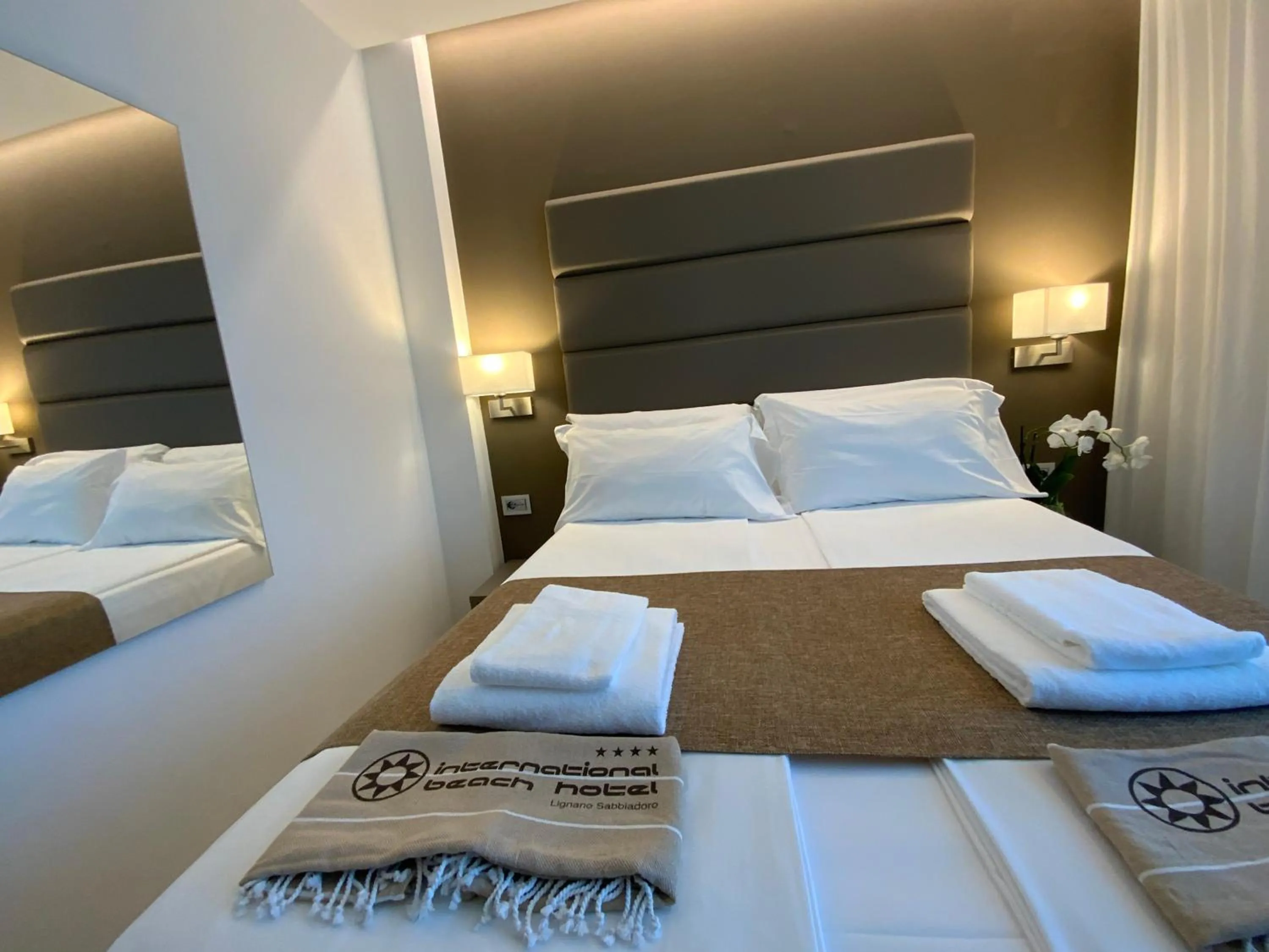 Bedroom, Bed in International Beach Hotel