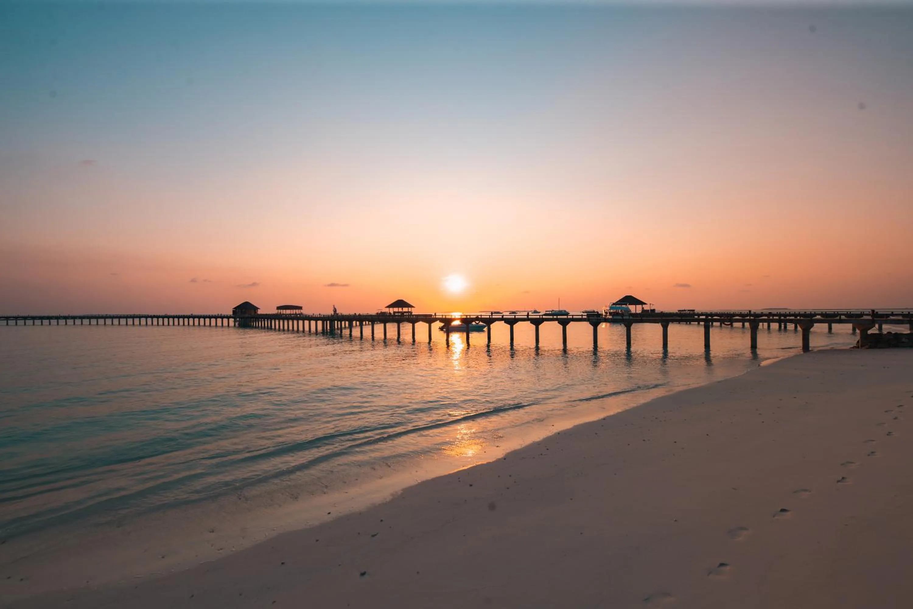 Sunset in Sun Siyam Iru Fushi with Free Transfer