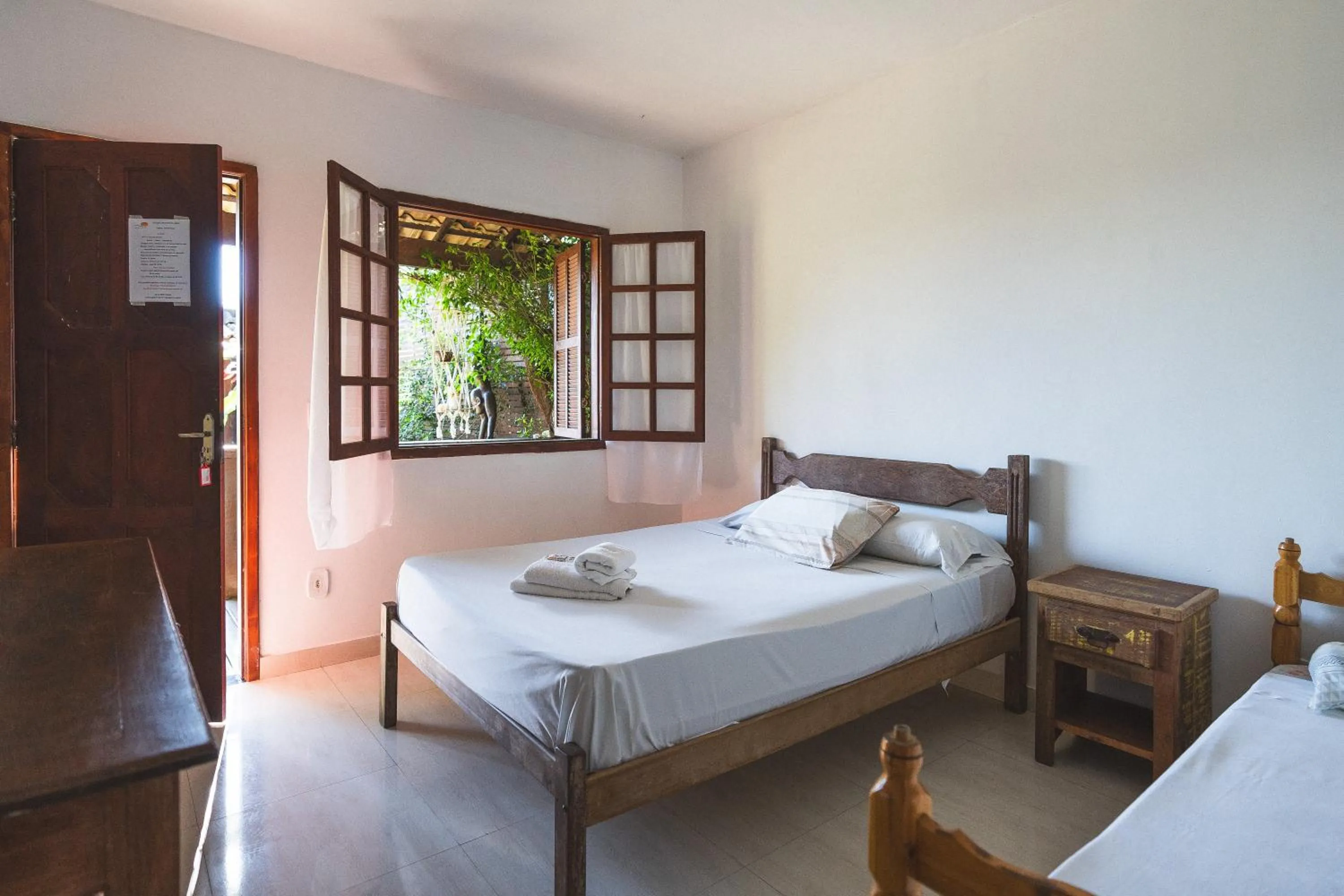 Bed in POUSADA ENCANTO DO AMOR