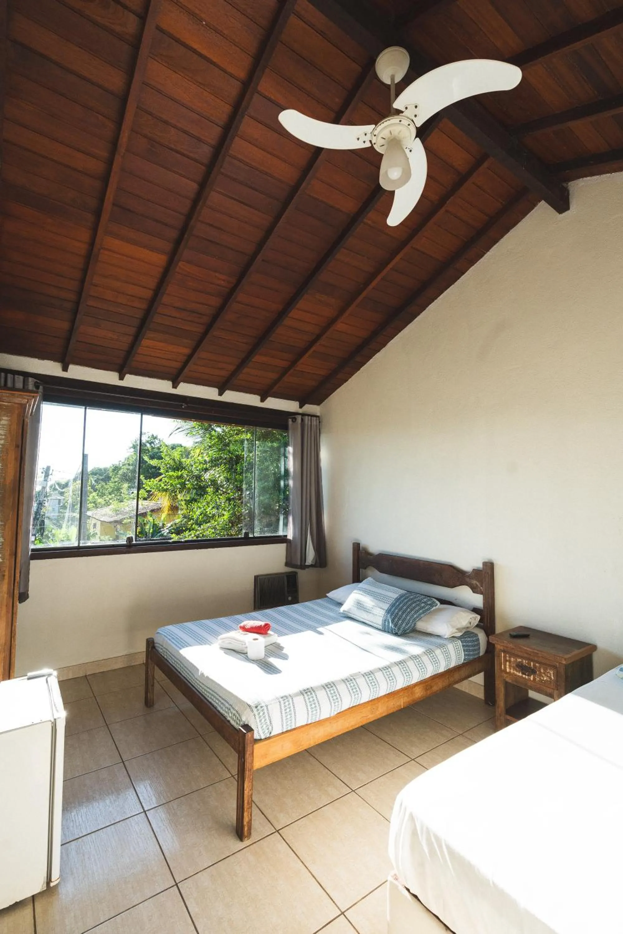 Bed in POUSADA ENCANTO DO AMOR