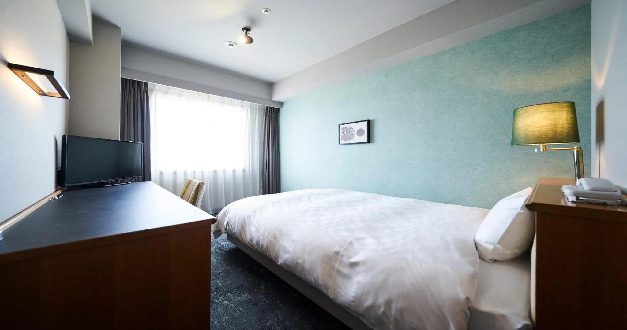 Bed in Hotel Grand Ciel Hanamaki