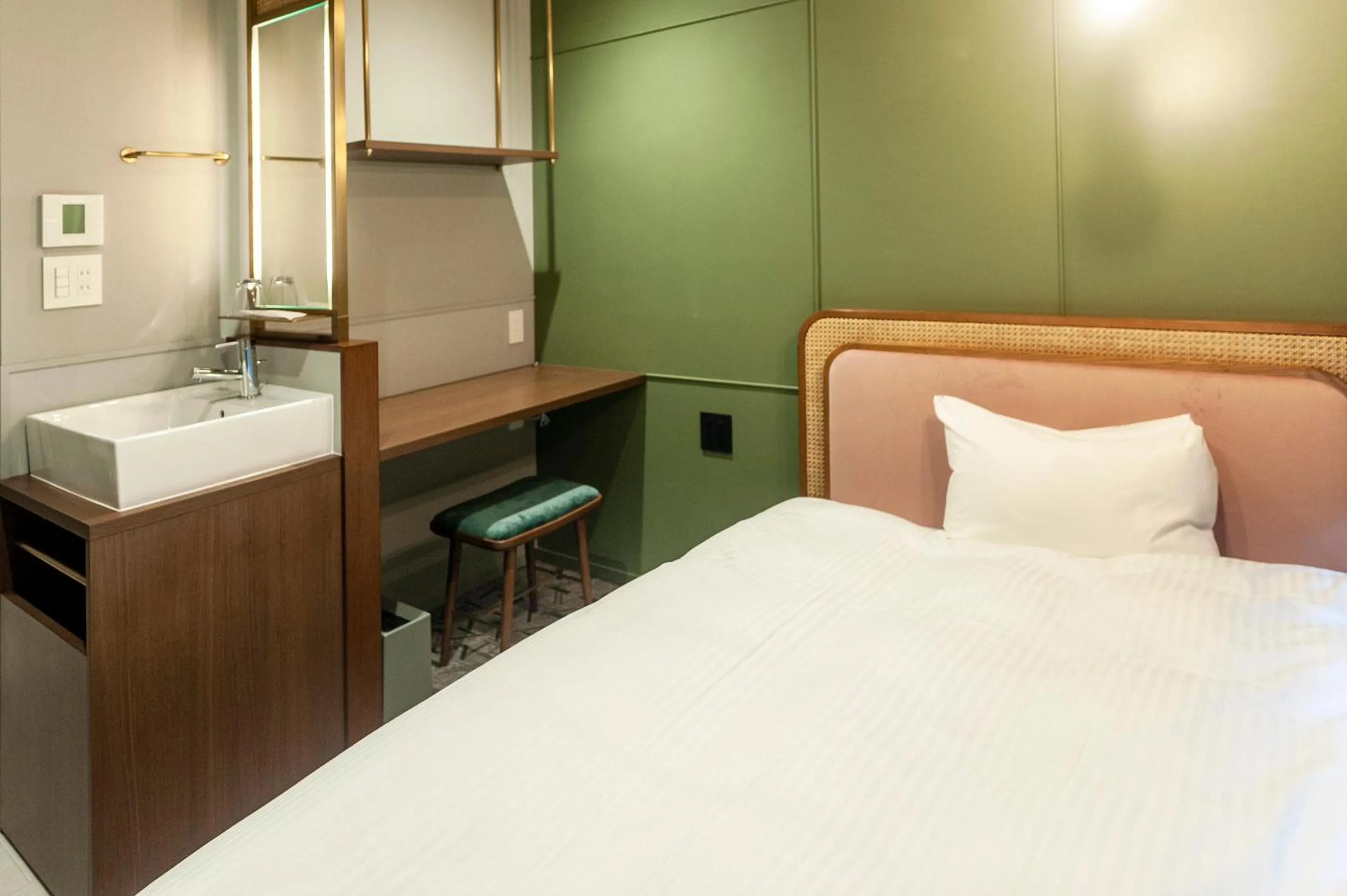 Bed in Mito Sannomaru Hotel