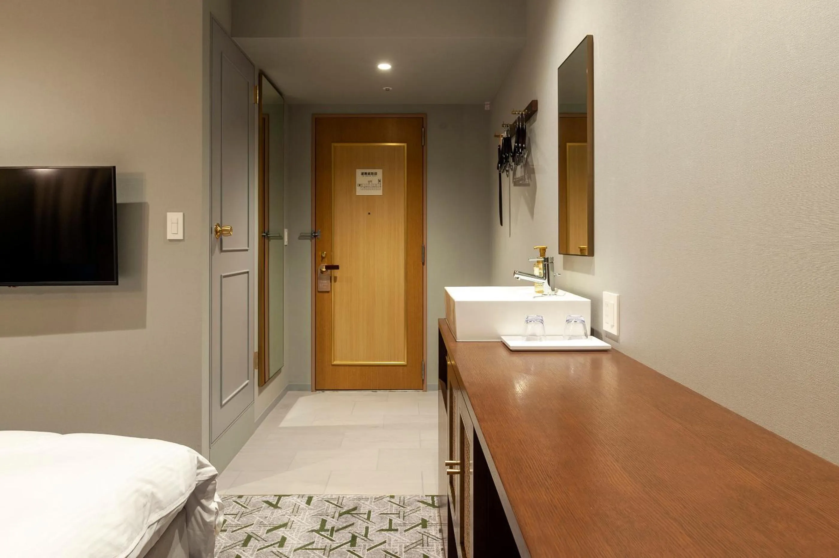 Bed in Mito Sannomaru Hotel