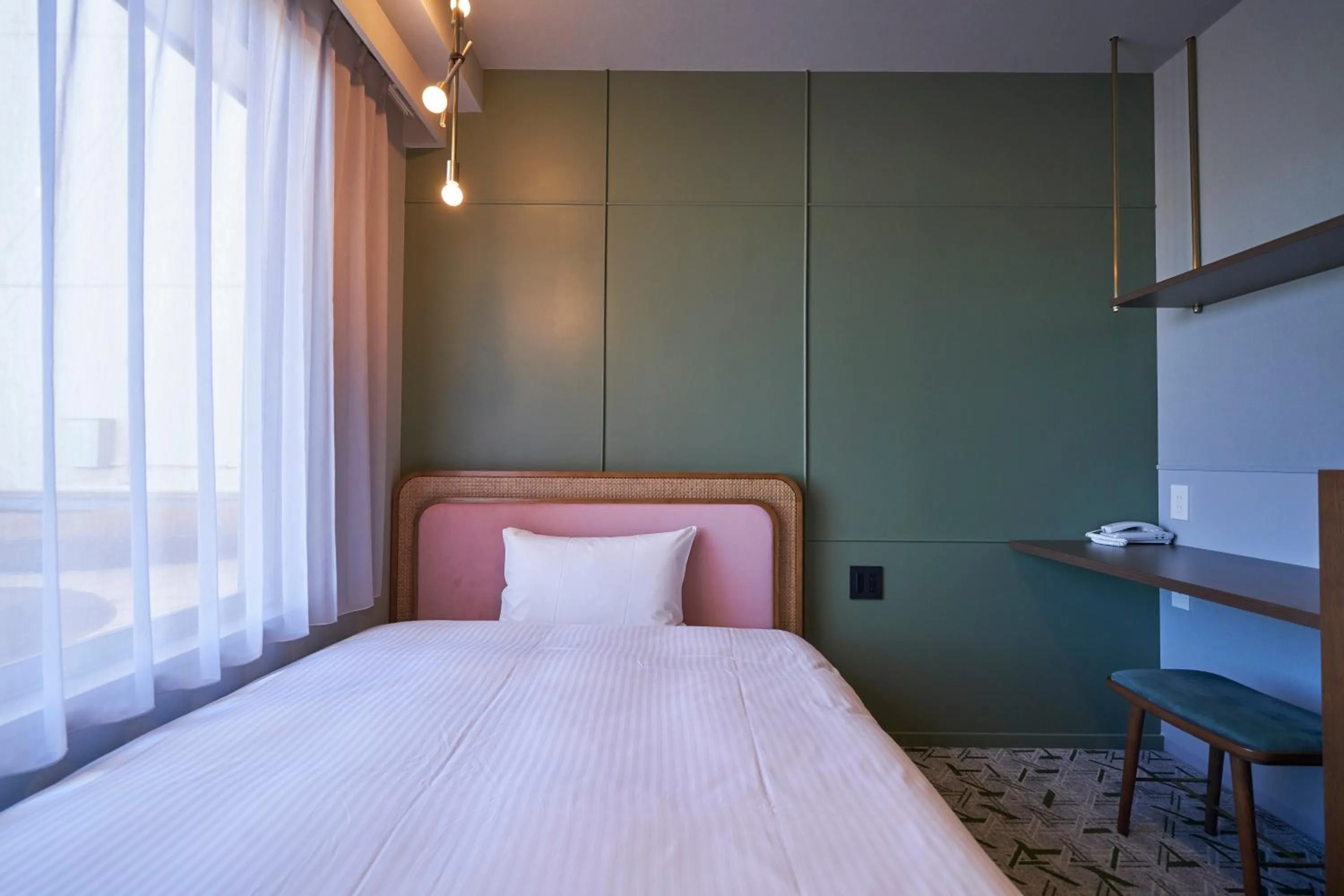 Bed in Mito Sannomaru Hotel