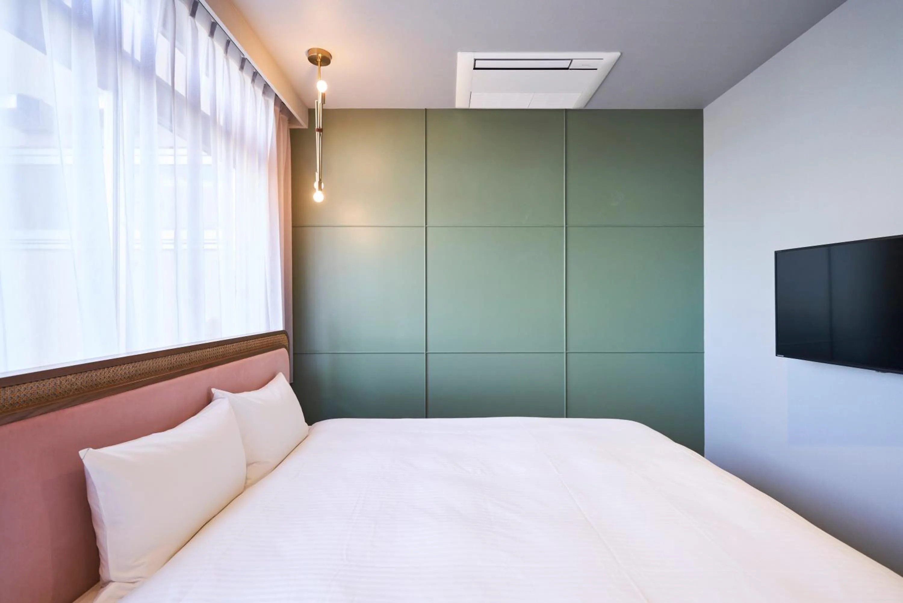 Bed in Mito Sannomaru Hotel