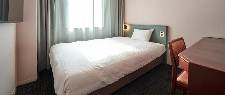 Bed in Saitama Grand Hotel Honjo