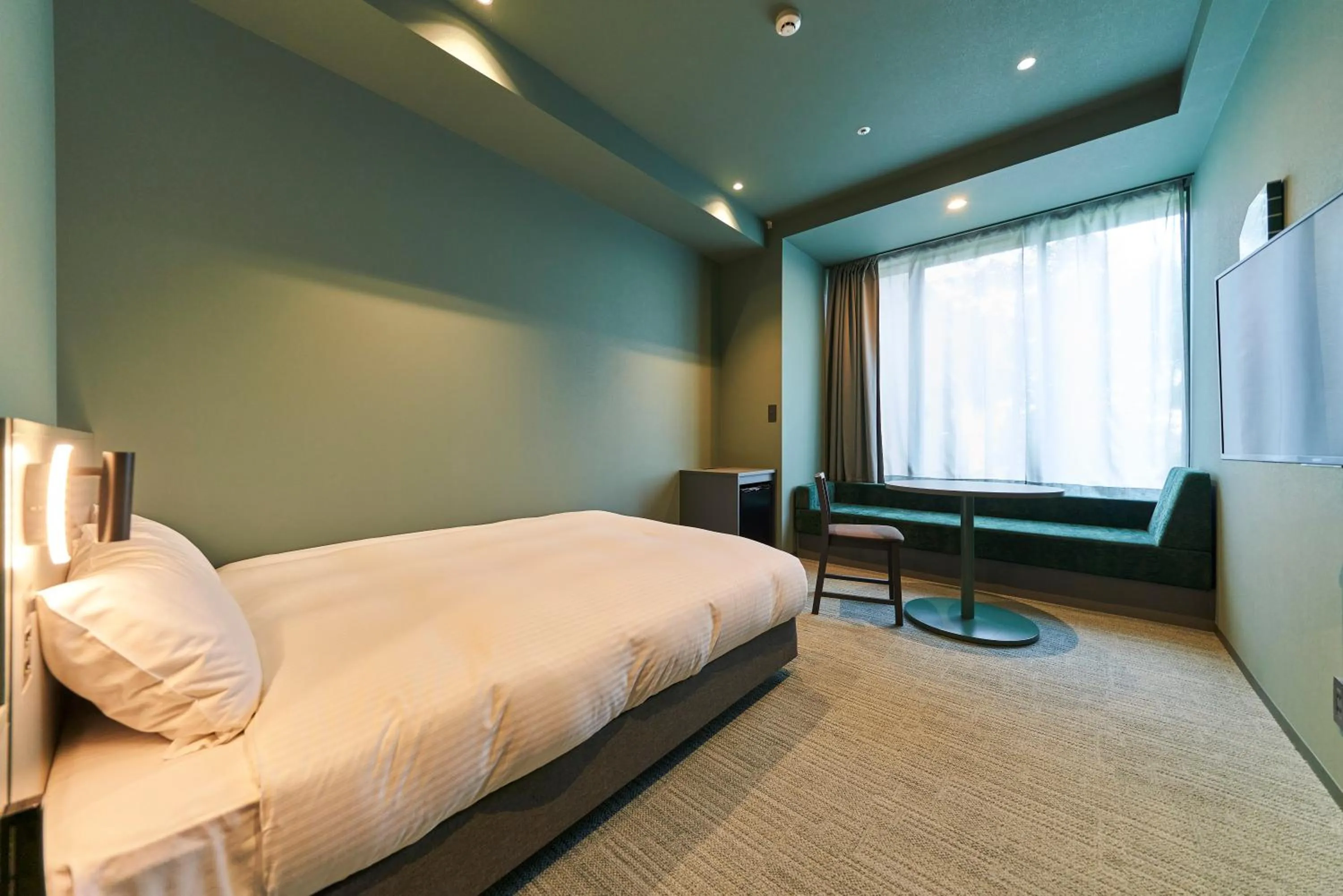 Bed in Saitama Grand Hotel Fukaya