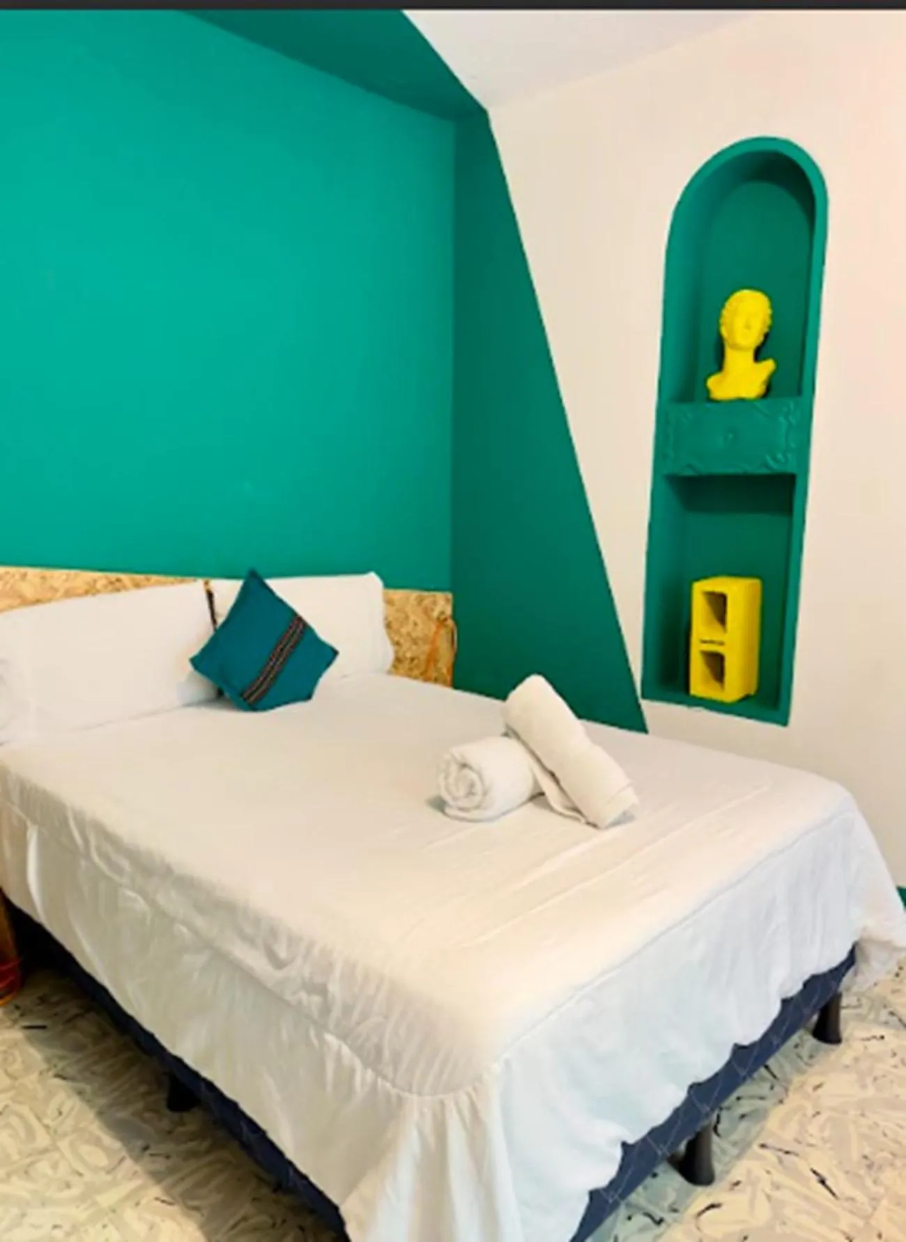 Bed in Why Not Hotel