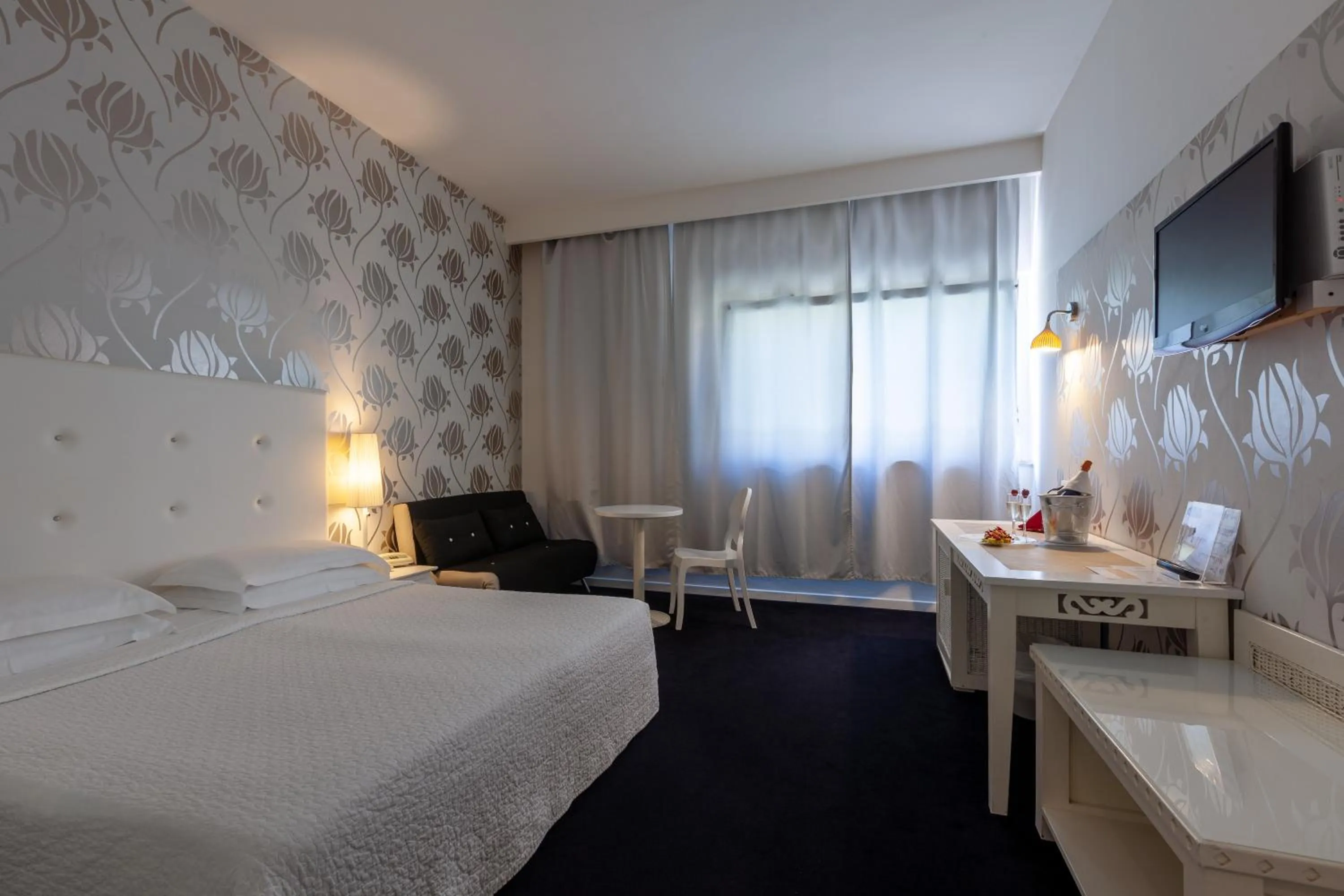 Bed in Hotel Mediterraneo