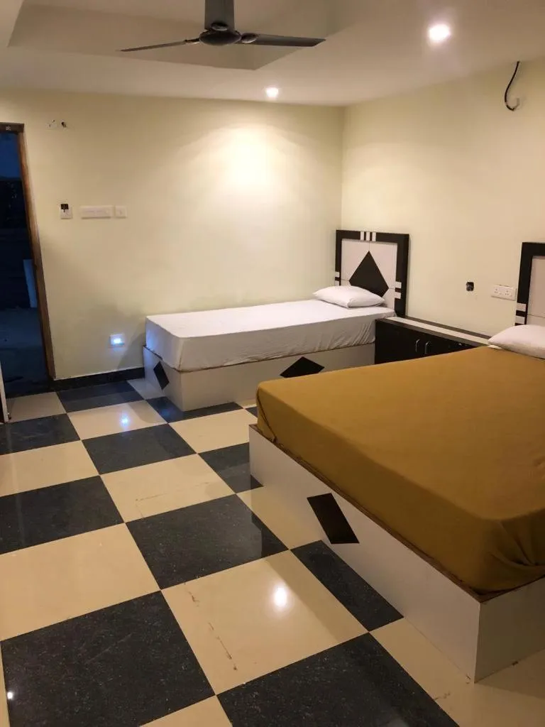 Bed in Srirathna Temple View Inn