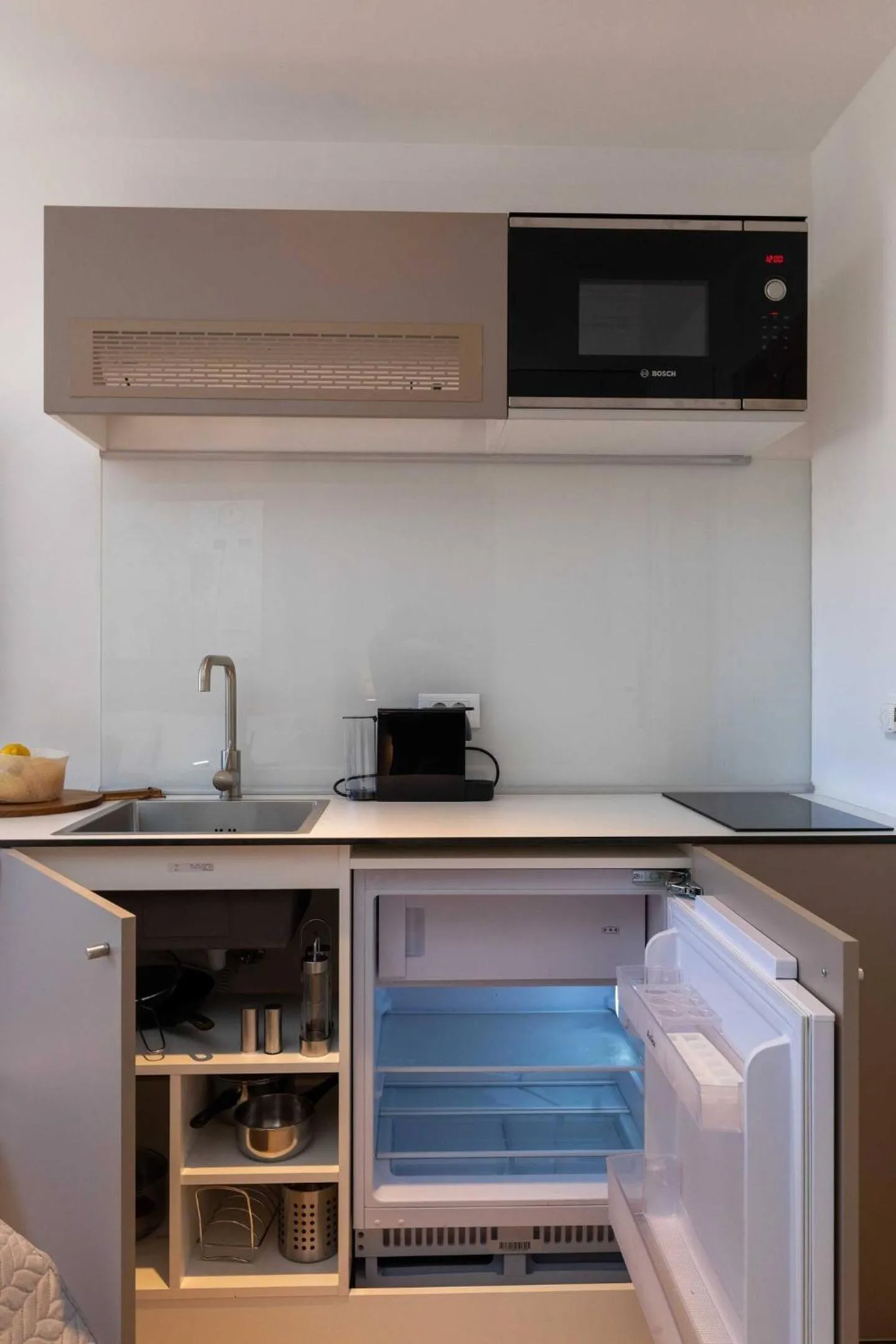 Kitchen or kitchenette in Old Town Apartments u nikse