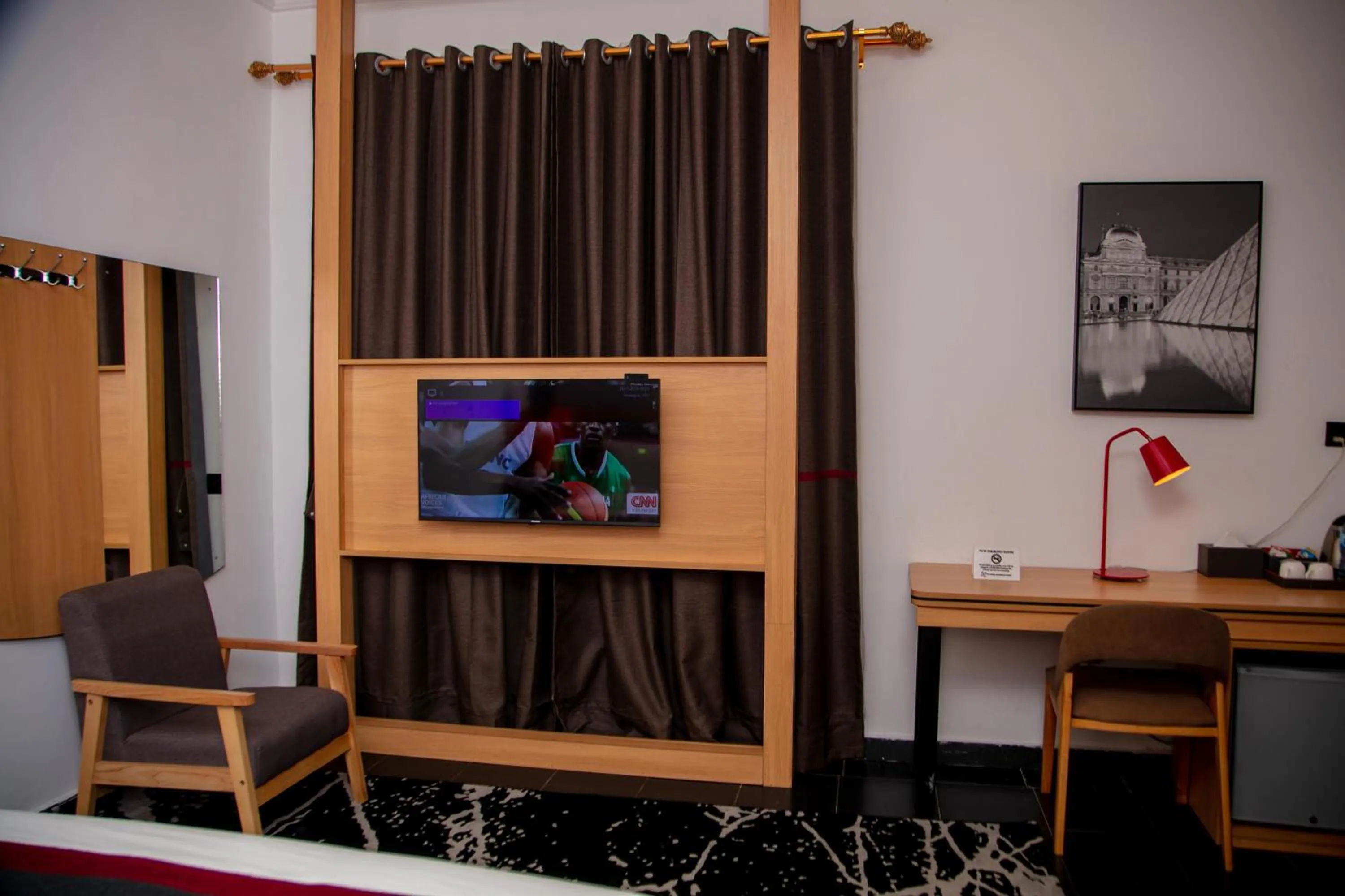 Bed in Ivy Hotel Emerald