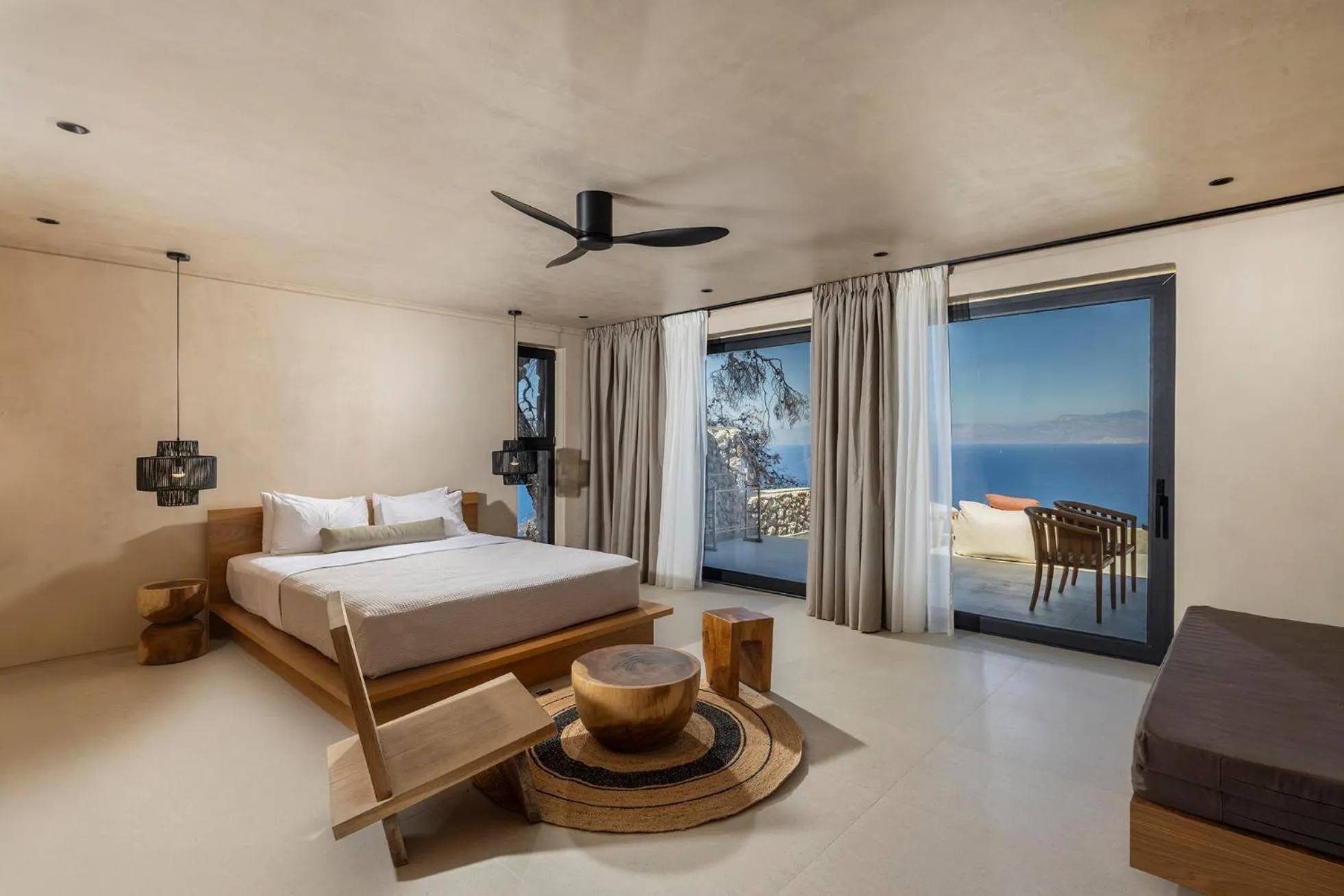 Bed in ​Le Grand Bleu Resort