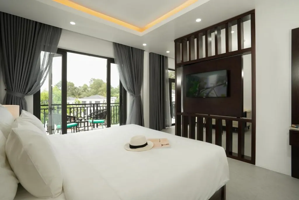 Communal lounge/ TV room, Bed in DAD Resort Phú Quốc