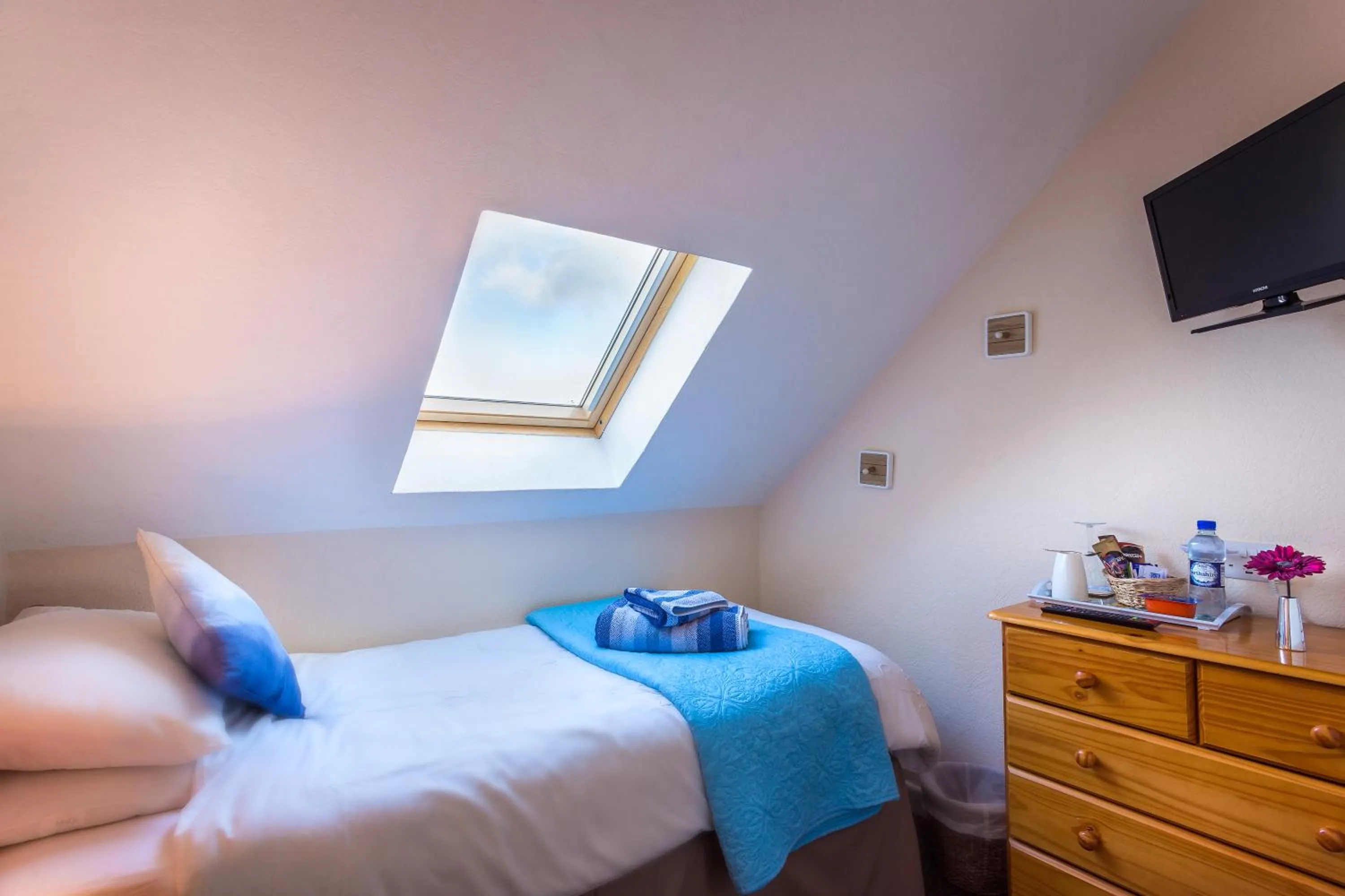 Bed in Neptunes Rest Guest Hotel