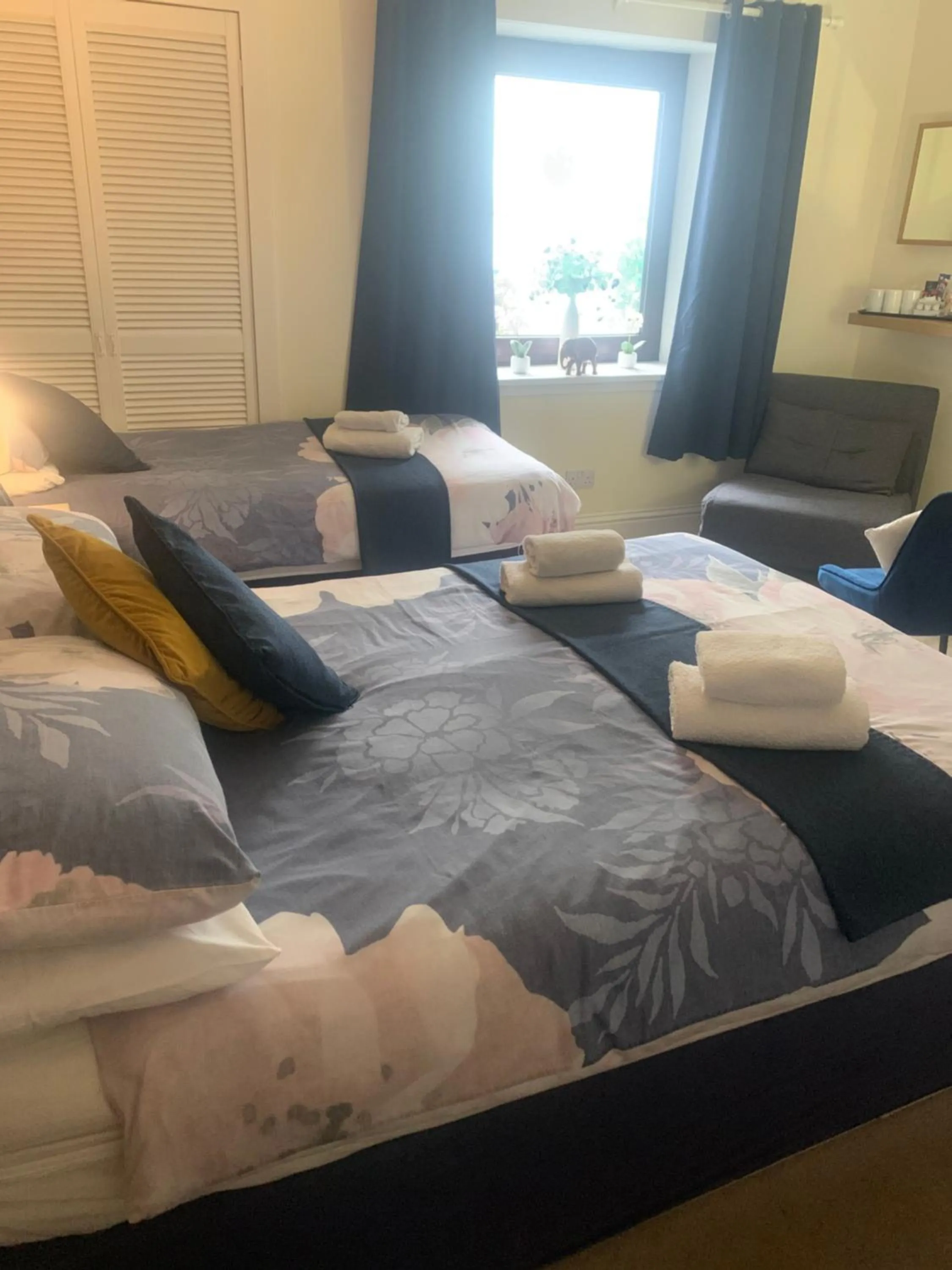 Bed in Neptunes Rest Guest Hotel