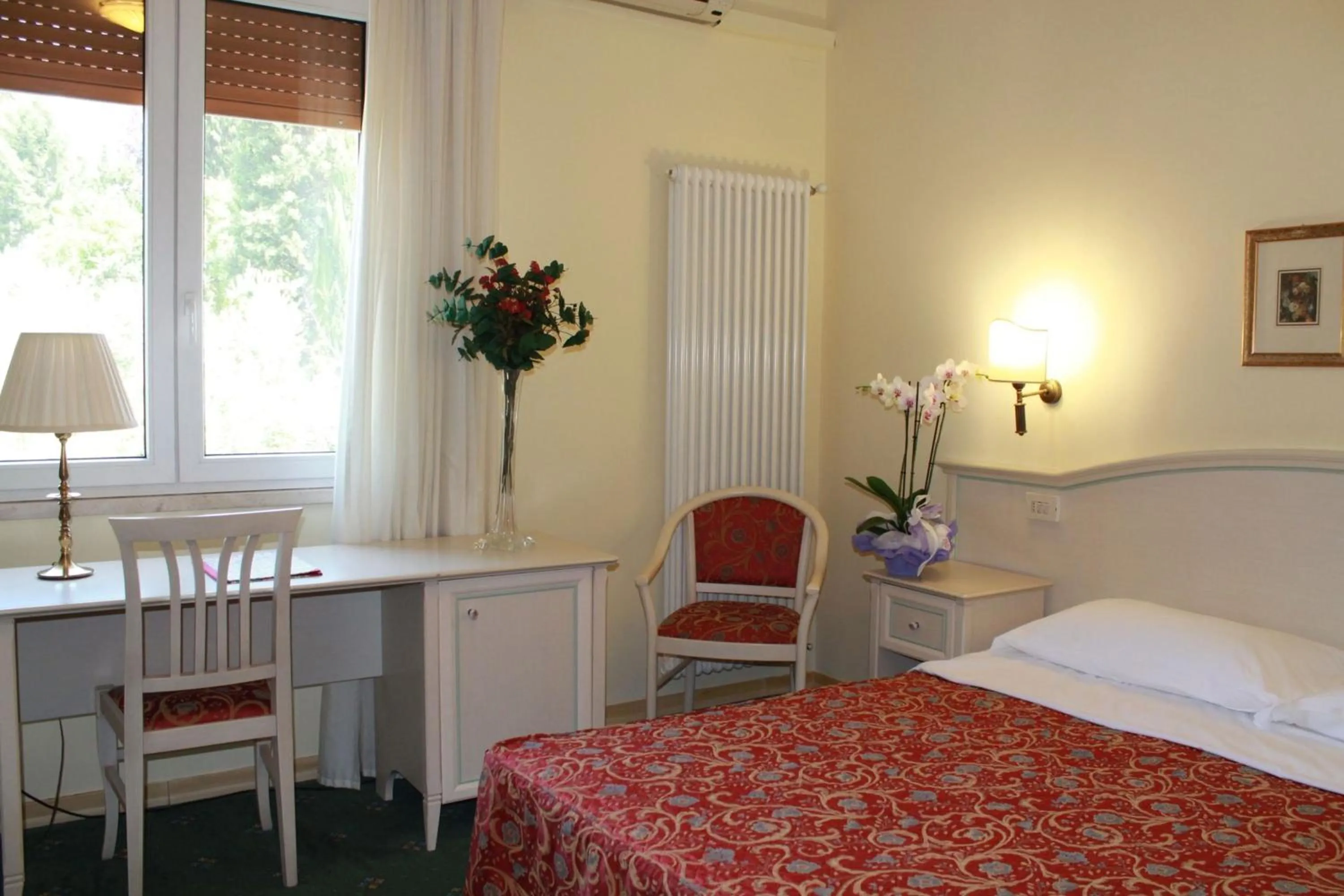 Bed in Hotel Monna Lisa