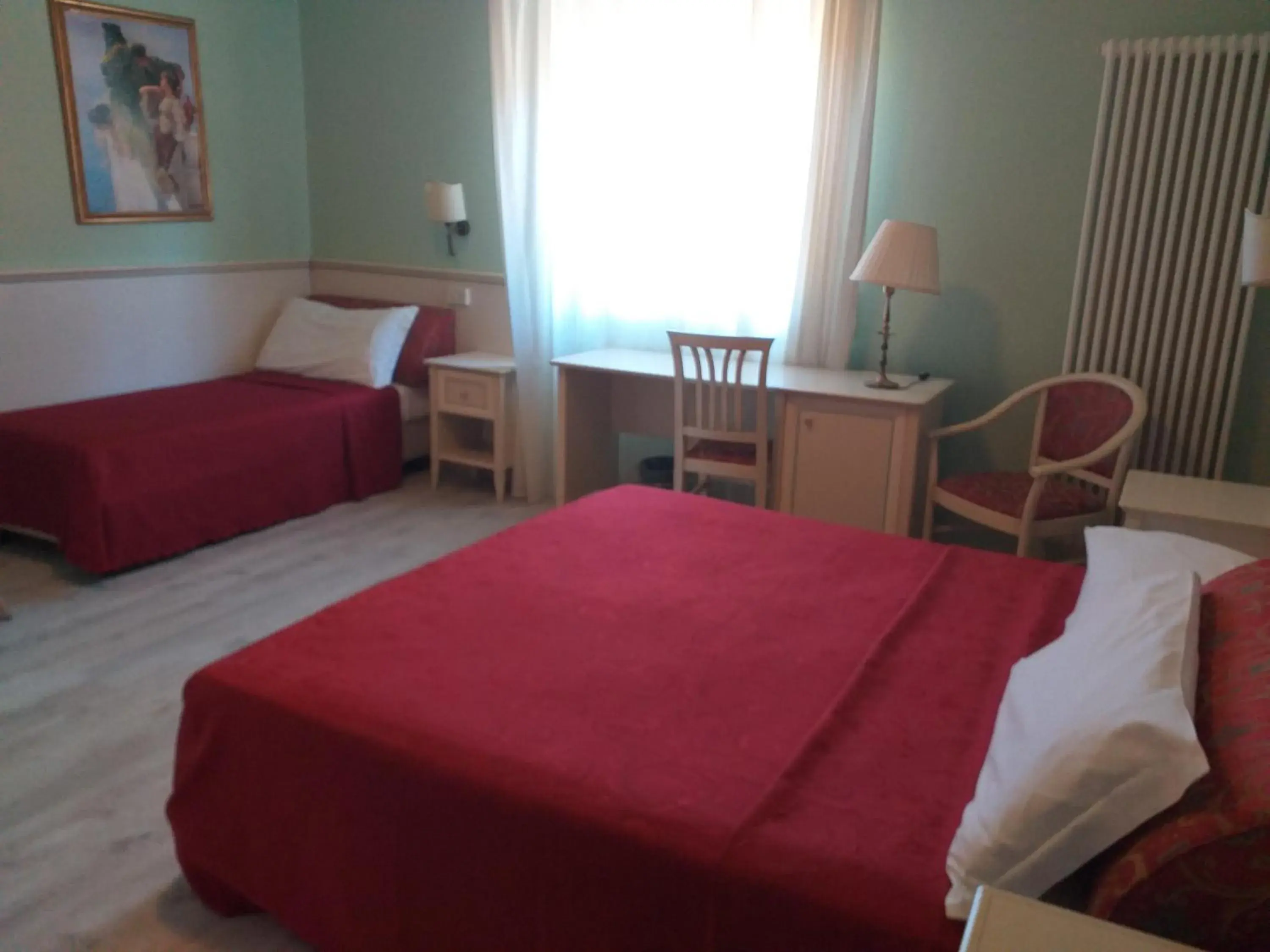 Triple Room in Hotel Monna Lisa Triple Room in Hotel Monna Lisa