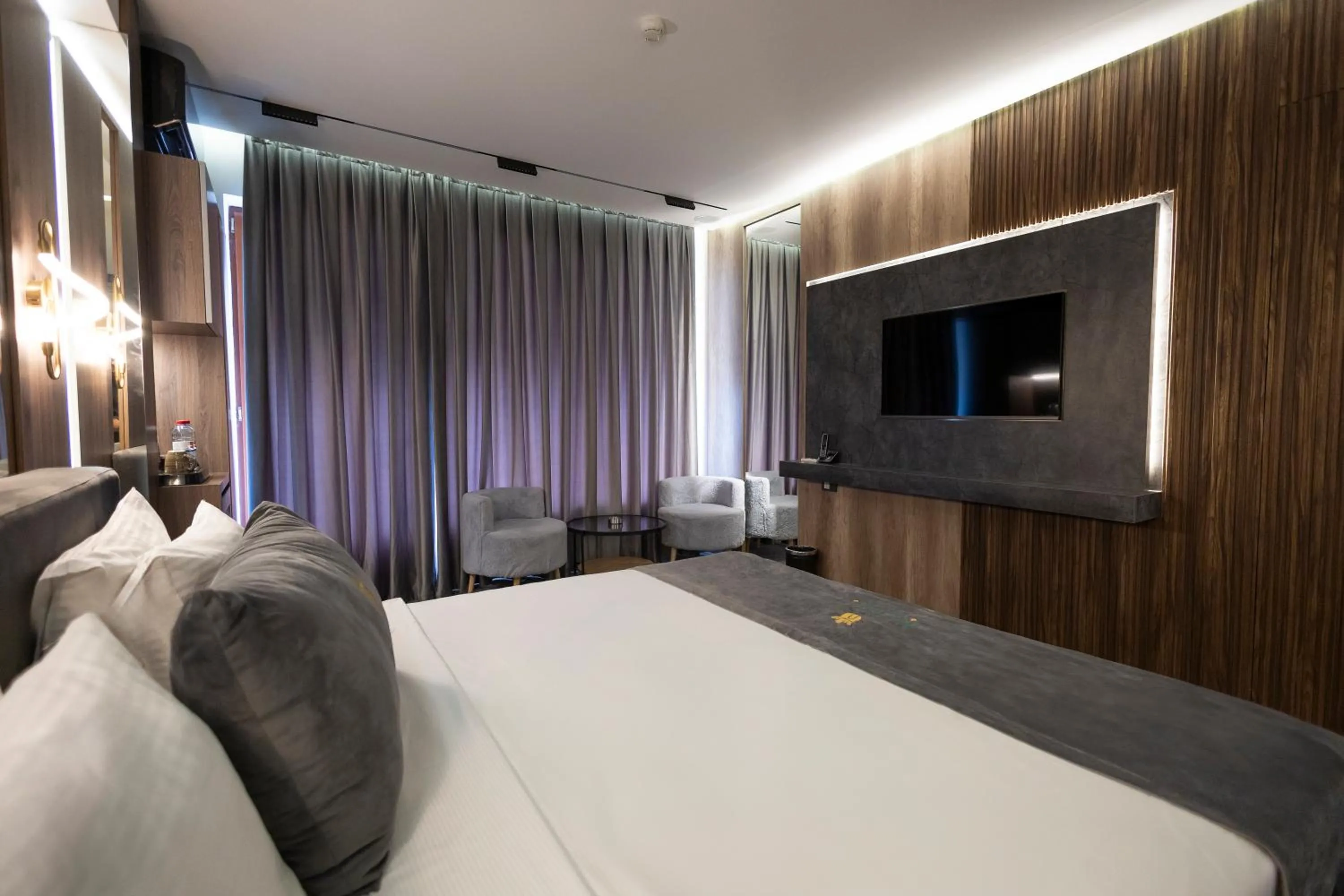 TV and multimedia, Bed in Merida Hotel Baku