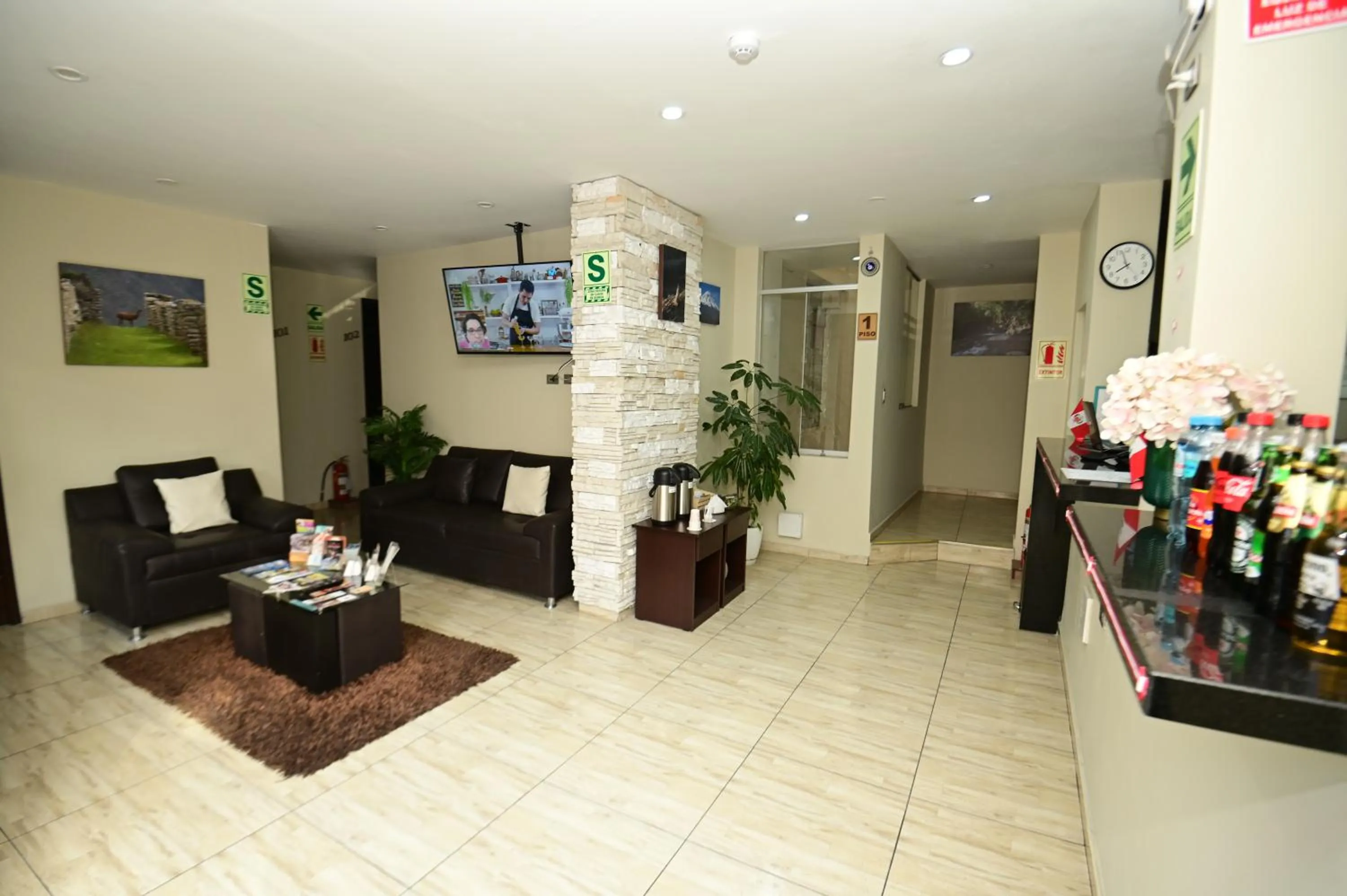 Communal lounge/ TV room in Bon Repos Boutique