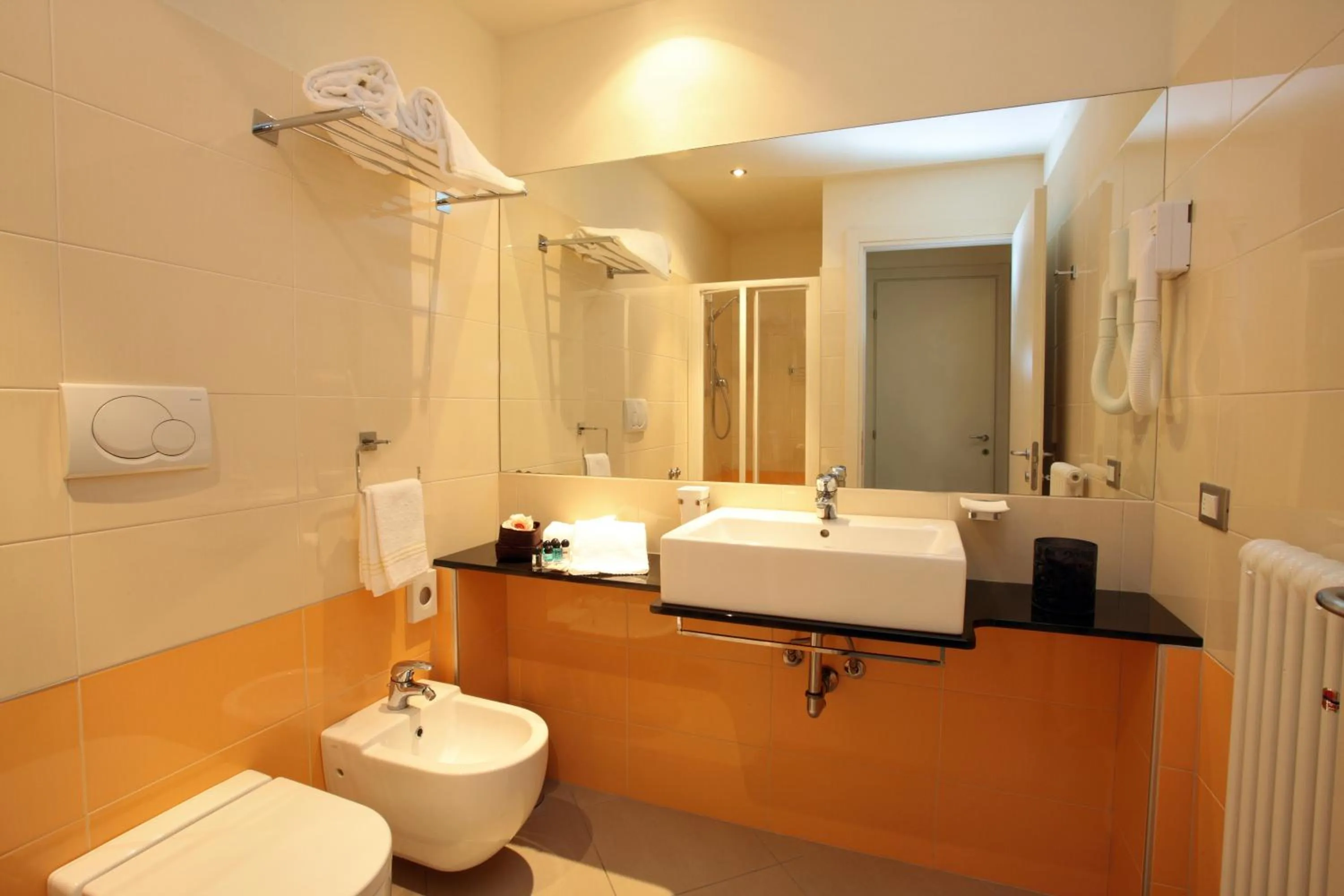Bathroom in Noha Suite Hotel